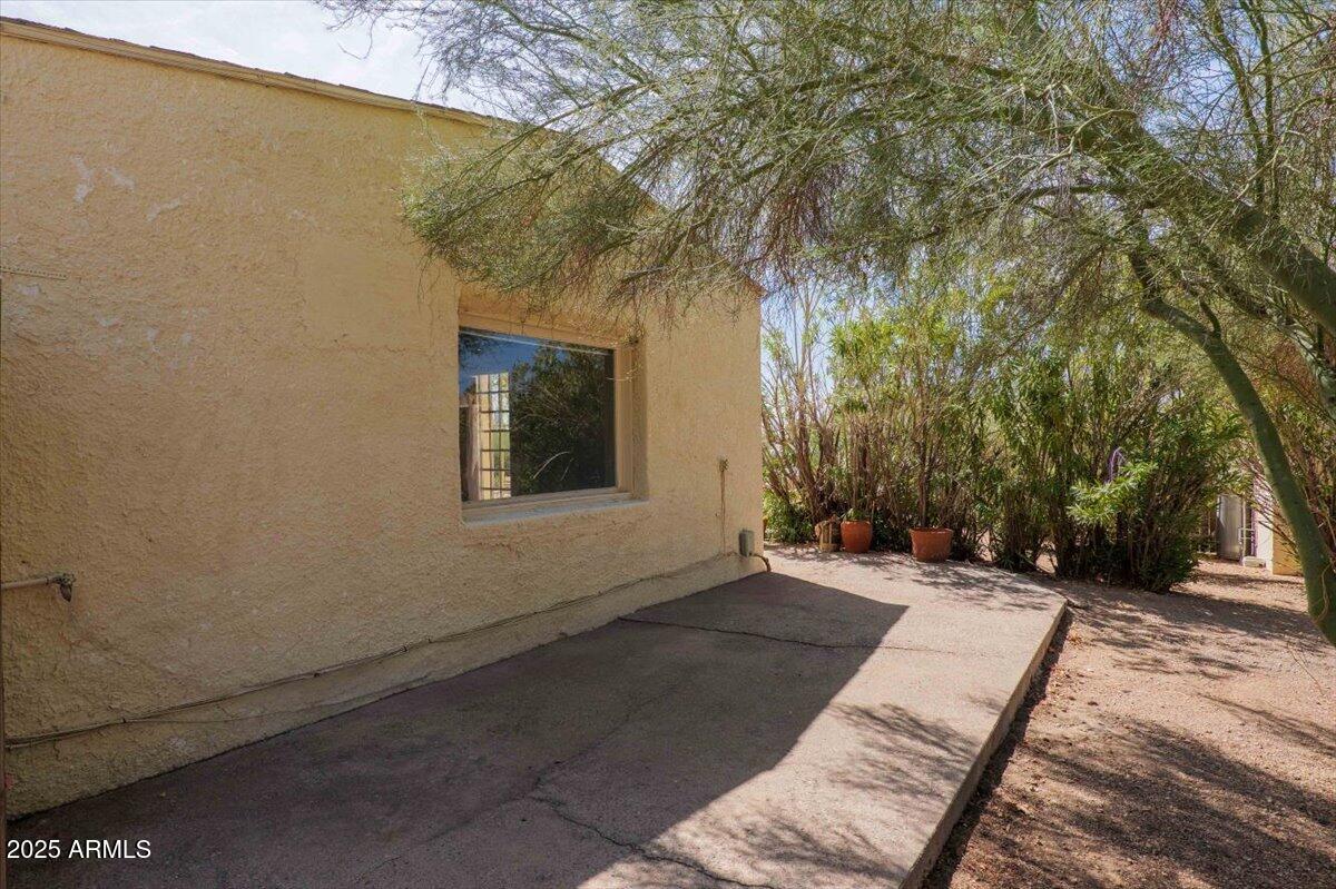 5702 East Camelback Road, Unit MEXICAN Phoenix, AZ 85251 - Photo 23 of 45 a view of backyard with a tree