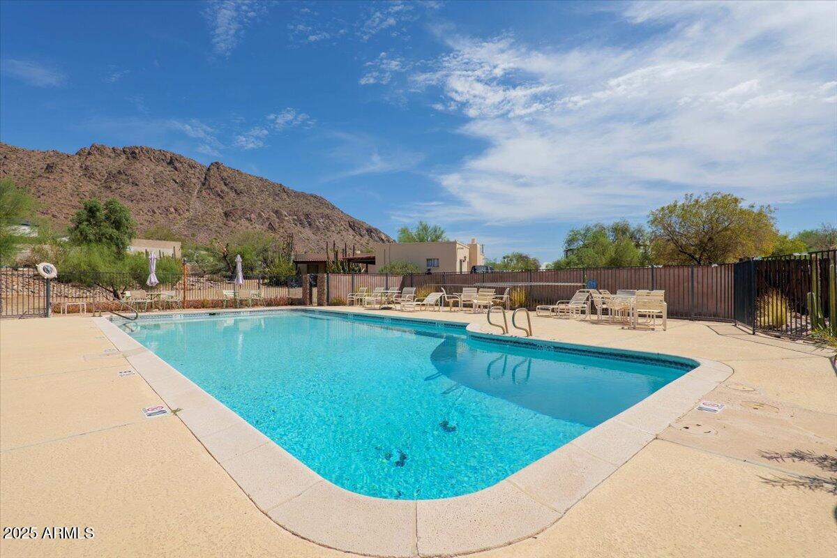 5702 East Camelback Road, Unit MEXICAN Phoenix, AZ 85251 - Photo 26 of 45 a view of a swimming pool with a terrace
