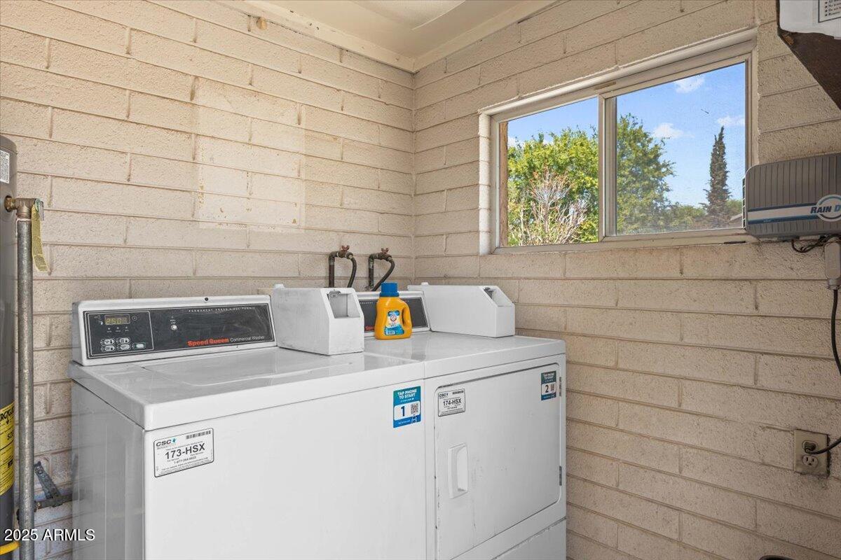 5702 East Camelback Road, Unit MEXICAN Phoenix, AZ 85251 - Photo 30 of 45 a utility room with dryer and washer