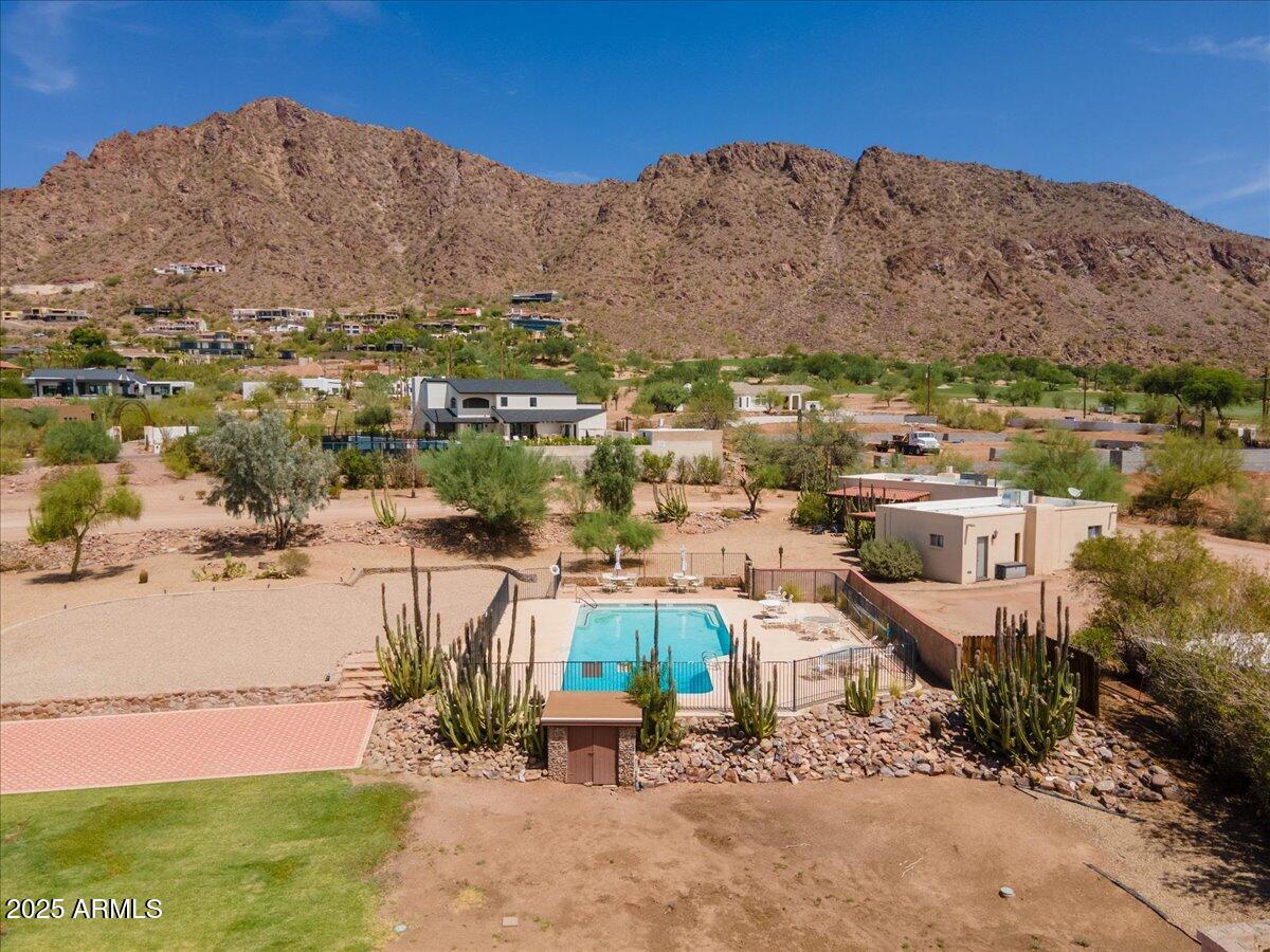5702 East Camelback Road, Unit MEXICAN Phoenix, AZ 85251 - Photo 35 of 45 an aerial view of residential houses with outdoor space and trees