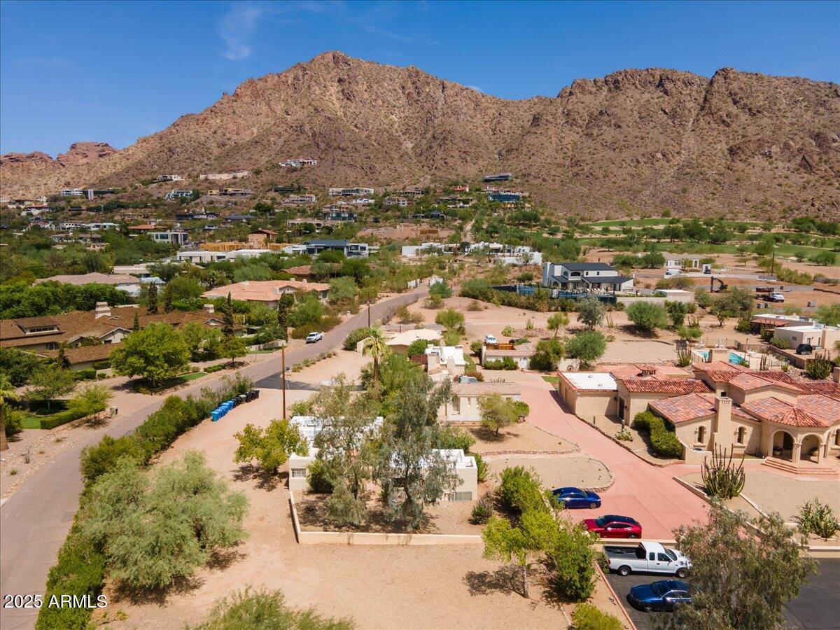 5702 East Camelback Road, Unit MEXICAN Phoenix, AZ 85251 - Photo 39 of 45 an aerial view of residential houses with outdoor space and trees