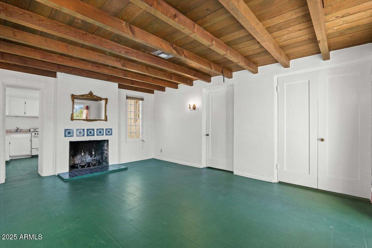 5702 East Camelback Road, Unit MEXICAN Phoenix, AZ 85251 - Photo 6 of 45 a view of an empty room with a fireplace