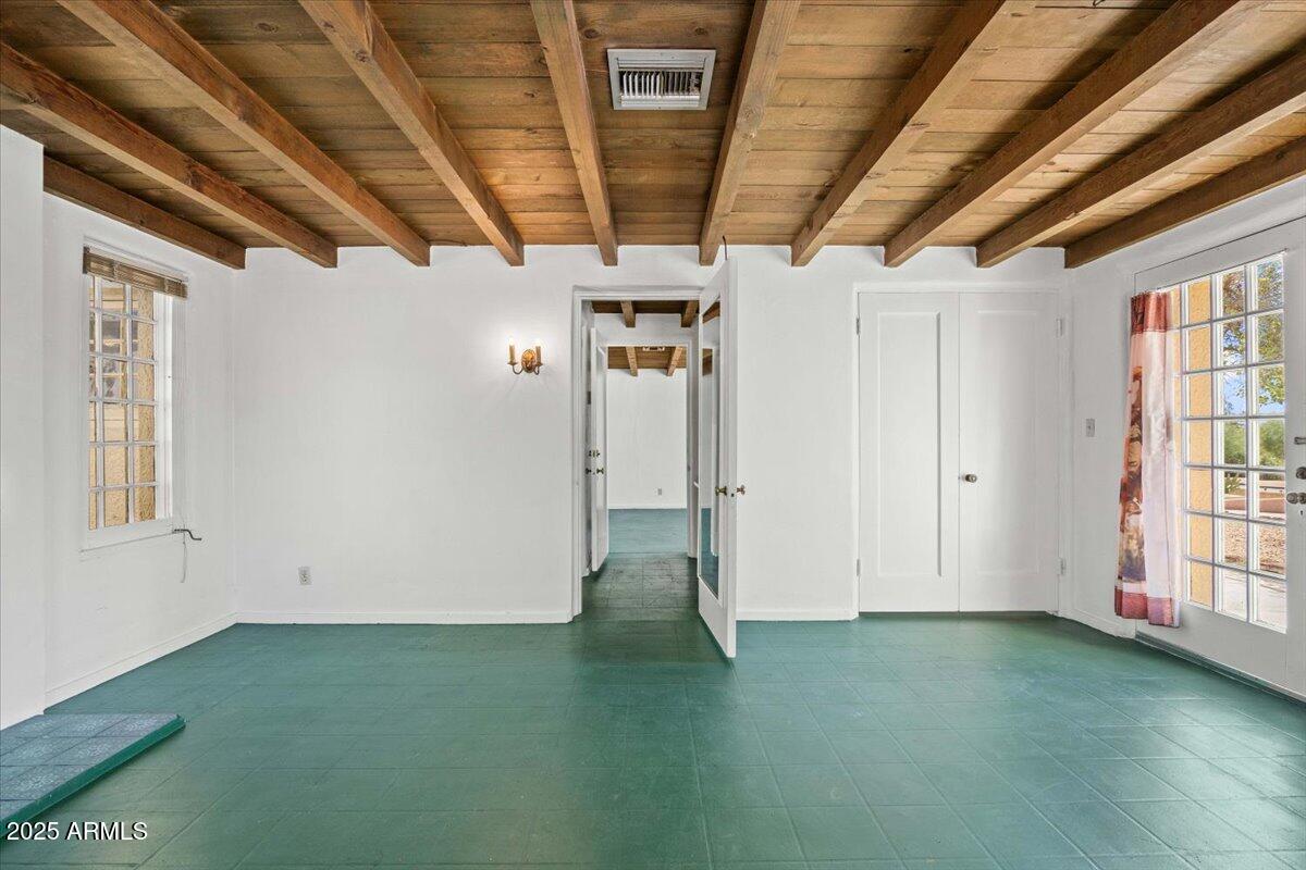 5702 East Camelback Road, Unit MEXICAN Phoenix, AZ 85251 - Photo 8 of 45 a view of empty room with windows