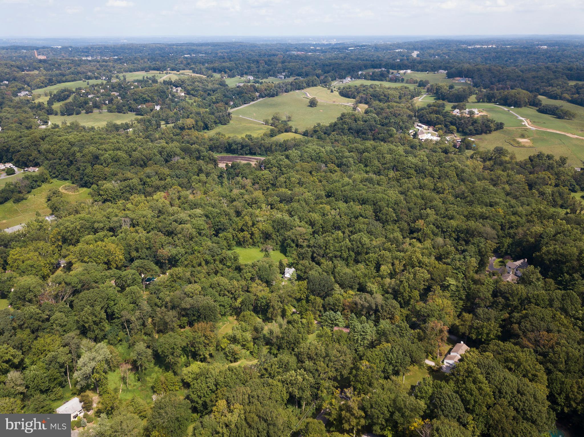 3111 Sawmill Road Newtown Square, PA 19073 - Photo 3 of 8 an aerial view of houses with yard and mountain view in back