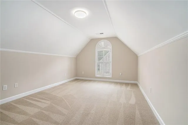 an empty room with a empty space and window