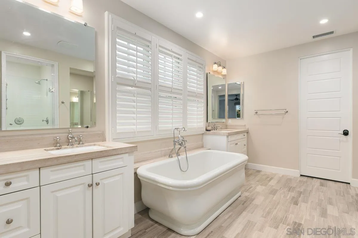7923 Silvery Moon Lane Rancho Santa Fe, CA 92067 - Photo 16 of 22 a bathroom with a sink and a bathtub