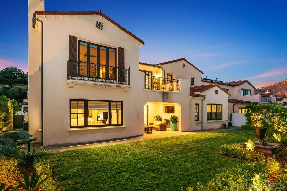 7923 Silvery Moon Lane Rancho Santa Fe, CA 92067 - Photo 21 of 22 a front view of a house with a yard