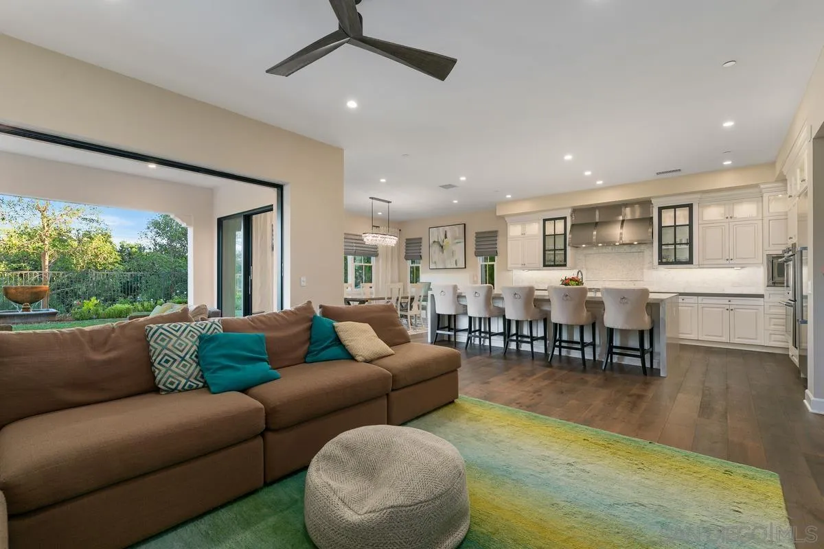 7923 Silvery Moon Lane Rancho Santa Fe, CA 92067 - Photo 4 of 22 a living room with furniture and a large window