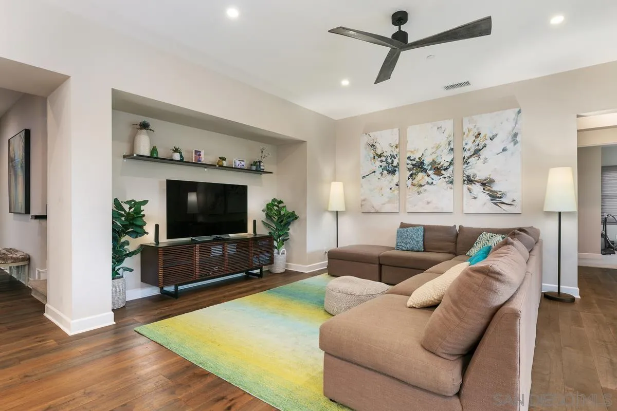 7923 Silvery Moon Lane Rancho Santa Fe, CA 92067 - Photo 5 of 22 a living room with furniture and a flat screen tv