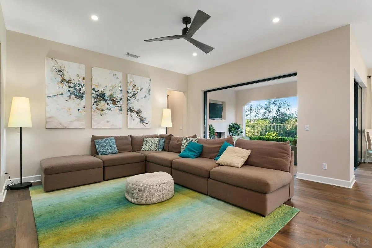 7923 Silvery Moon Lane Rancho Santa Fe, CA 92067 - Photo 6 of 22 a living room with furniture and a large window