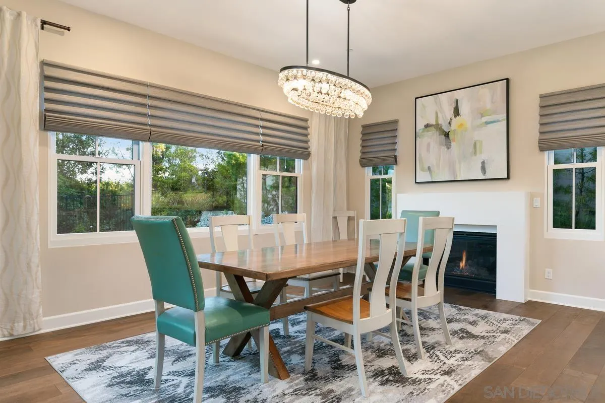7923 Silvery Moon Lane Rancho Santa Fe, CA 92067 - Photo 7 of 22 a view of a dining room with furniture window and wooden floor