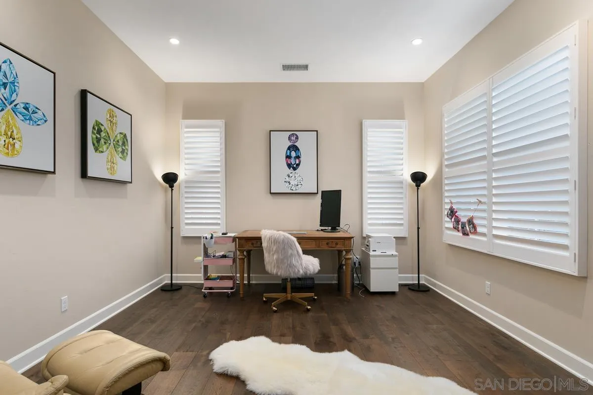 7923 Silvery Moon Lane Rancho Santa Fe, CA 92067 - Photo 9 of 22 a living room with furniture and a chair