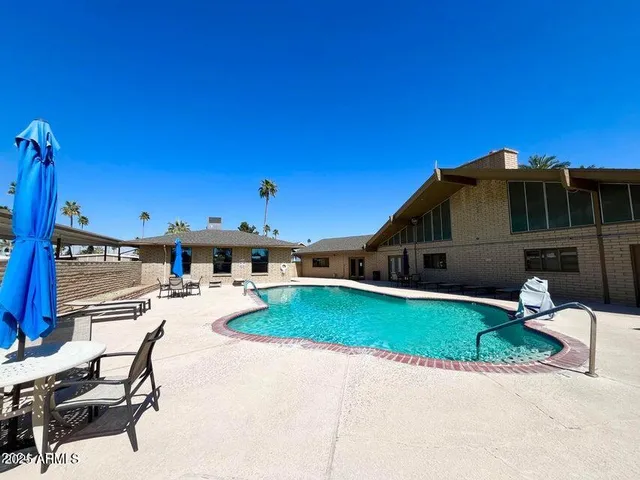 a view of a wooden door of the house
