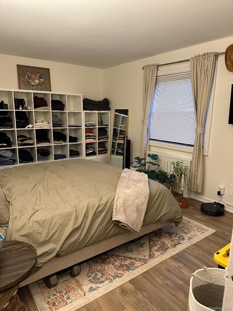 199-08 21st Avenue, Unit 1327 Queens, NY 11357 - Photo 7 of 21 a living room with furniture