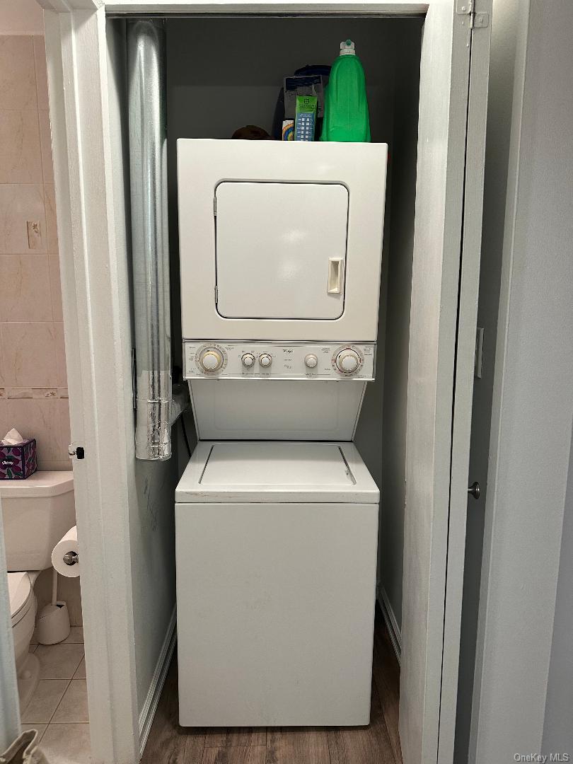 199-08 21st Avenue, Unit 1327 Queens, NY 11357 - Photo 10 of 21 a utility room with dryer and washer