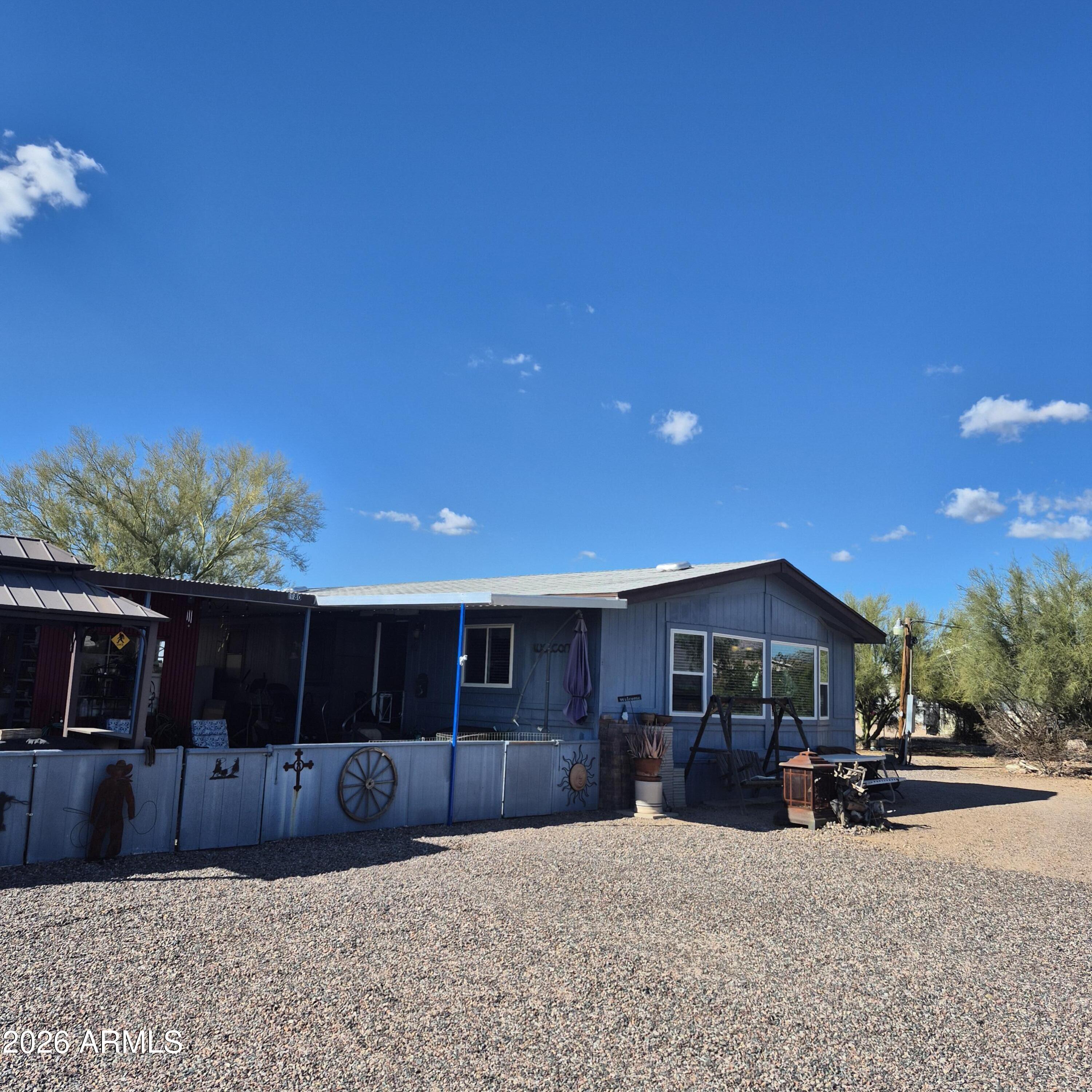 1980 South Hilton Road Apache Junction, AZ 85119 - Photo 2 of 42 a view of house with a entertaining space