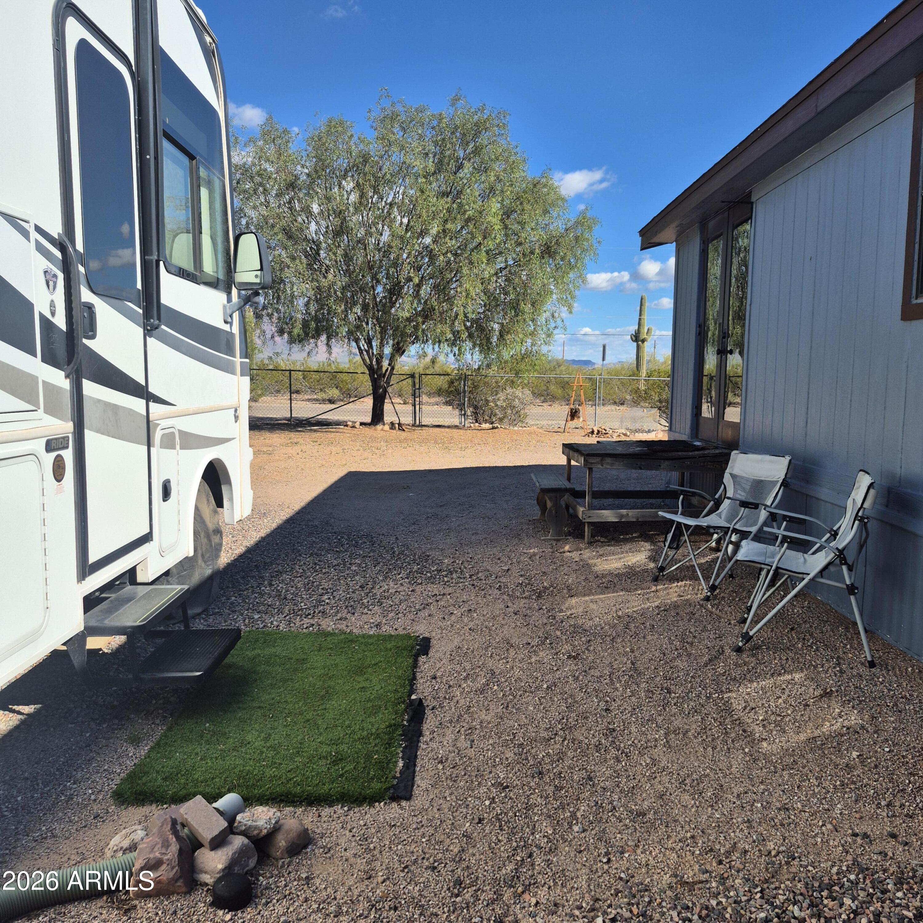 1980 South Hilton Road Apache Junction, AZ 85119 - Photo 22 of 42 a view of a backyard with sitting area