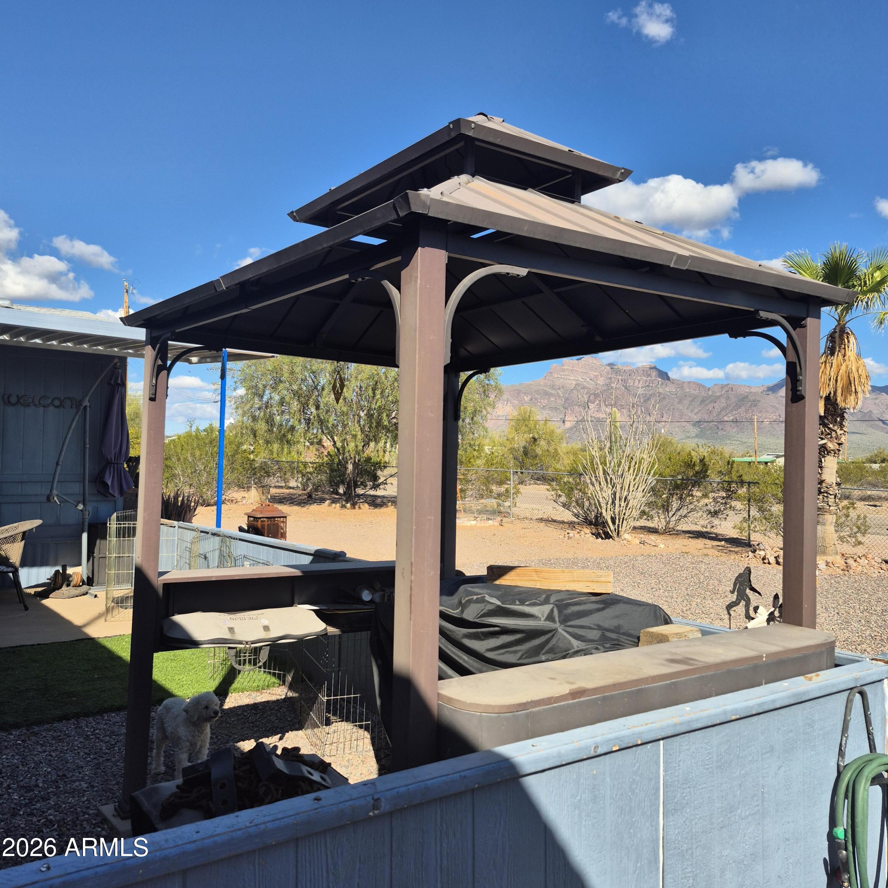 1980 South Hilton Road Apache Junction, AZ 85119 - Photo 27 of 42 a view of living room with furniture and a floor to ceiling window