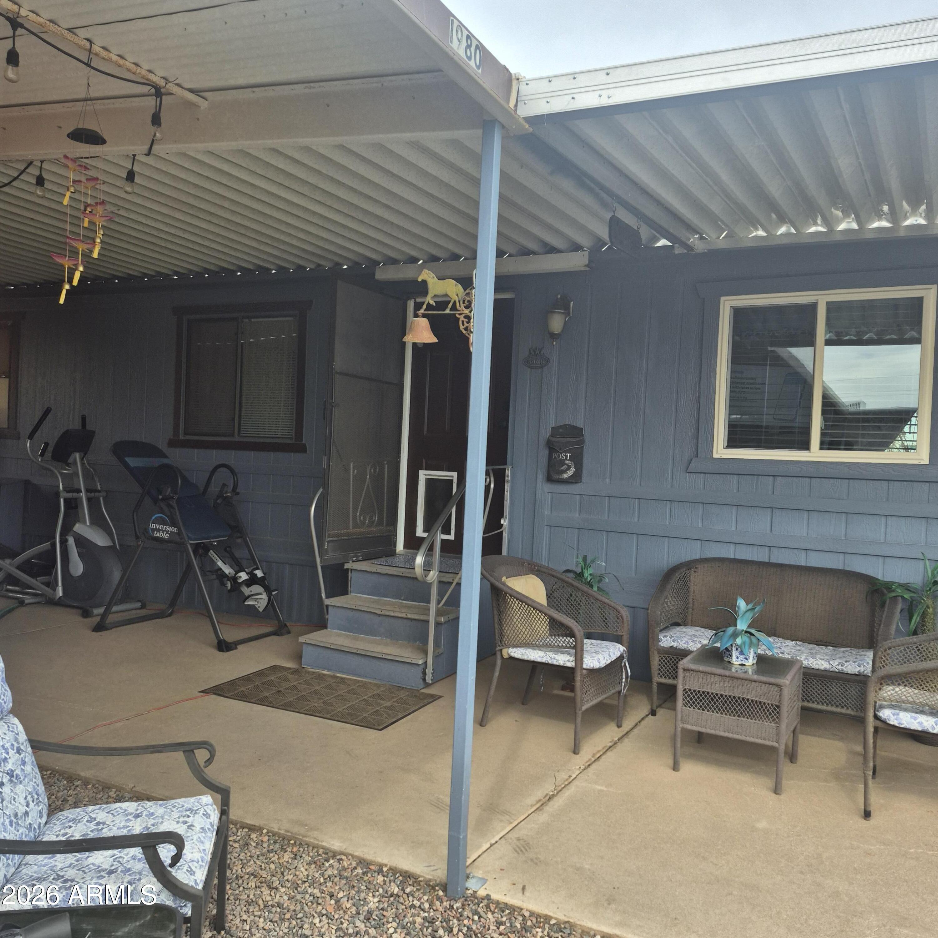 1980 South Hilton Road Apache Junction, AZ 85119 - Photo 31 of 42 a view of a patio with table and chairs