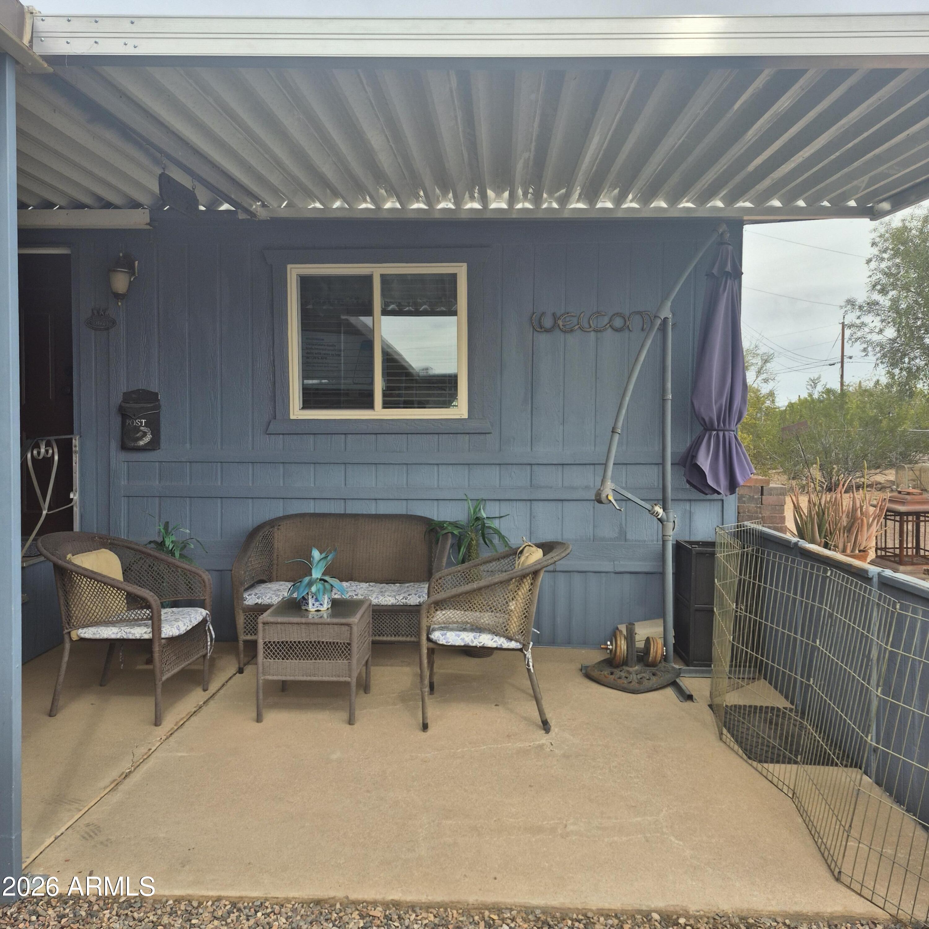 1980 South Hilton Road Apache Junction, AZ 85119 - Photo 32 of 42 a building outdoor space with patio furniture