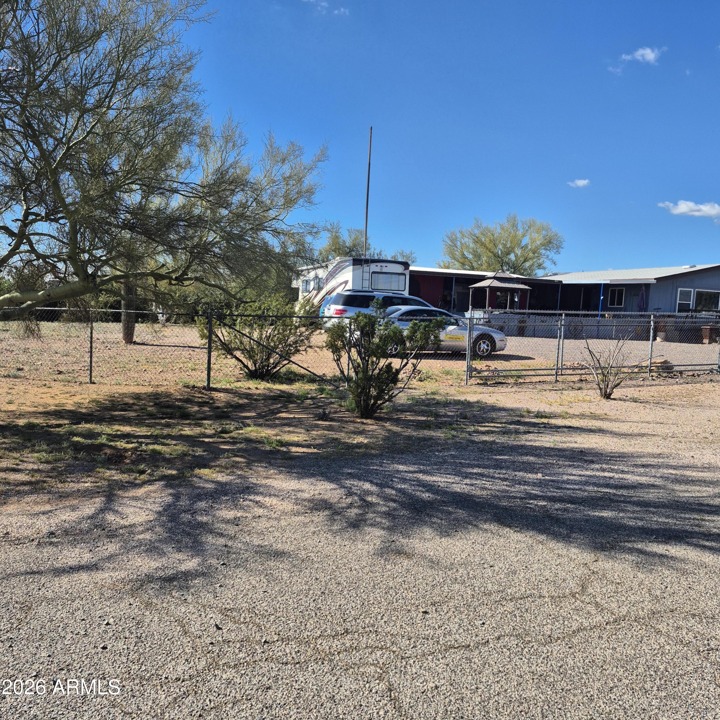 1980 South Hilton Road Apache Junction, AZ 85119 - Photo 5 of 42 a view of a playground with a house