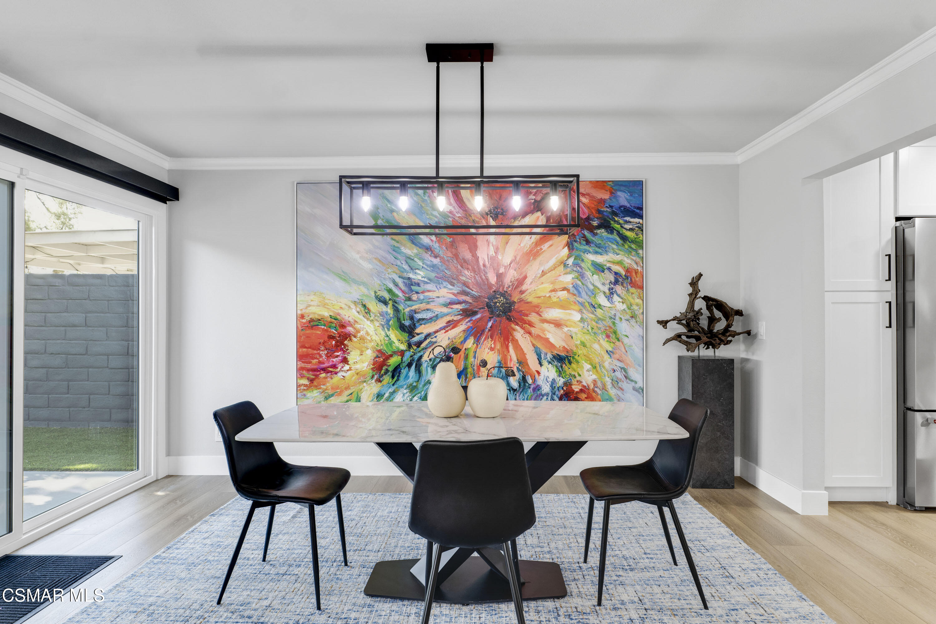 19120 Salt Lake Place Porter Ranch, CA 91326 - Photo 10 of 47 a view of a dining room with furniture and chandelier