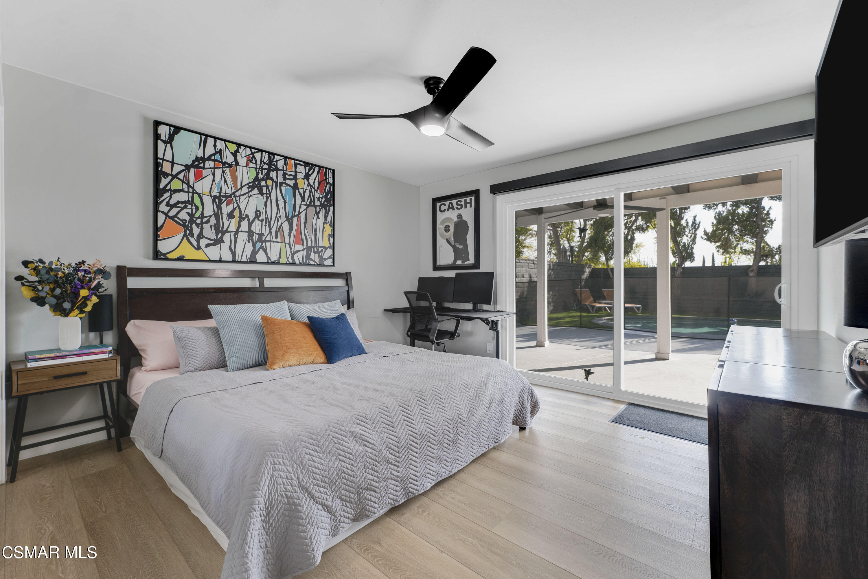 19120 Salt Lake Place Porter Ranch, CA 91326 - Photo 19 of 47 a living room with furniture large window and a flat screen tv