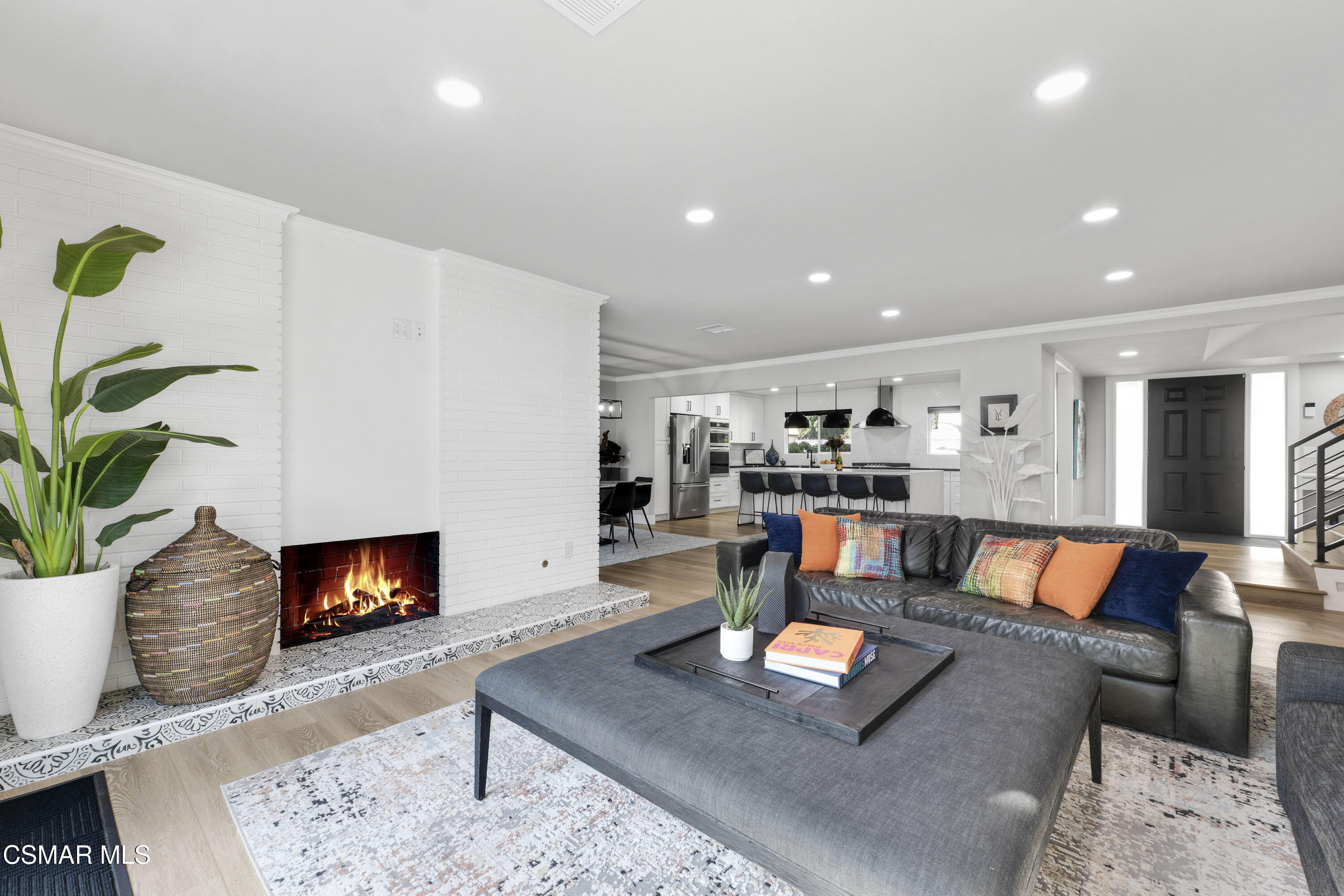 19120 Salt Lake Place Porter Ranch, CA 91326 - Photo 47 of 47 a living room with furniture and a fireplace