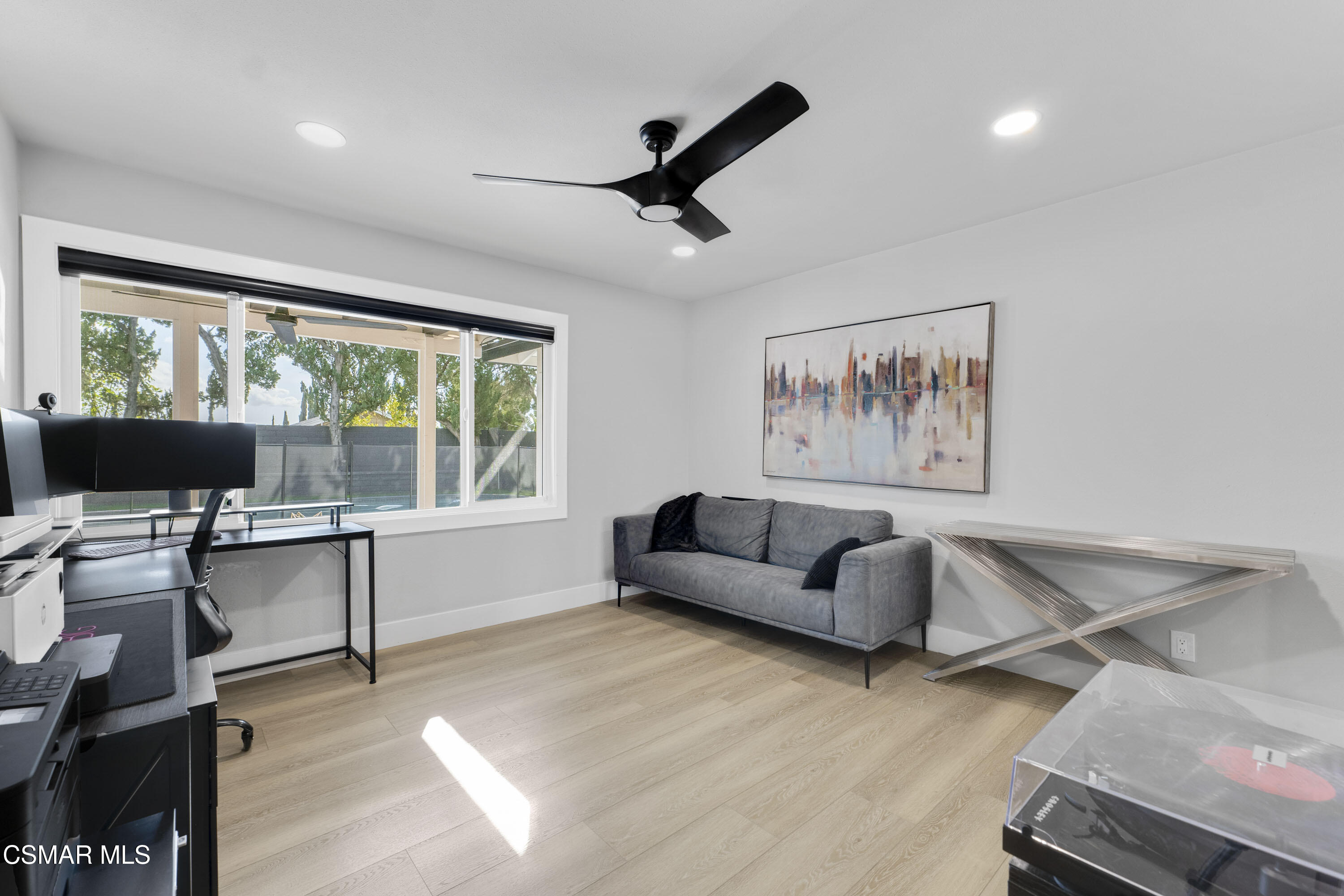 19120 Salt Lake Place Porter Ranch, CA 91326 - Photo 21 of 47 a living room with furniture and a flat screen tv