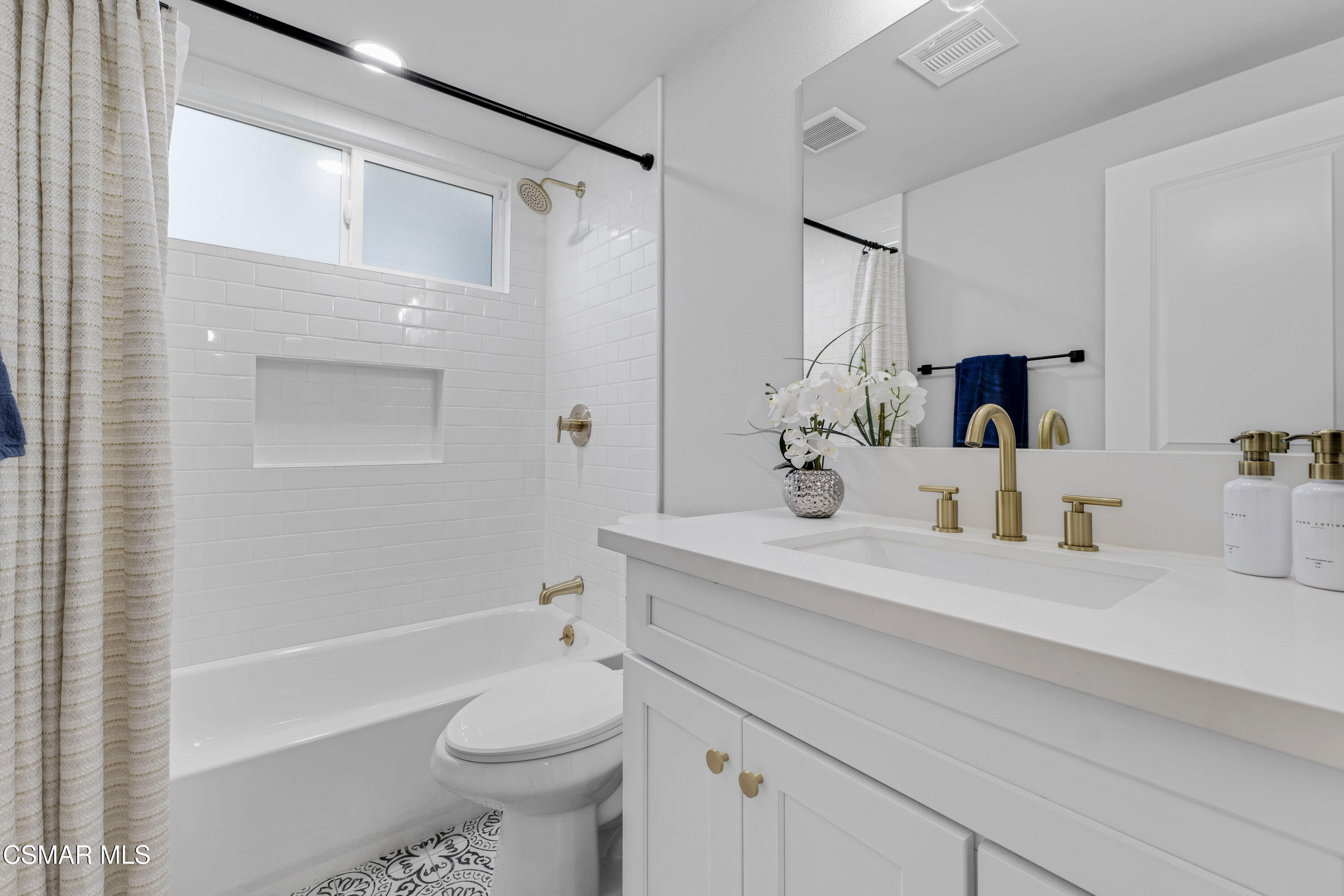 19120 Salt Lake Place Porter Ranch, CA 91326 - Photo 22 of 47 a bathroom with a sink a toilet and shower