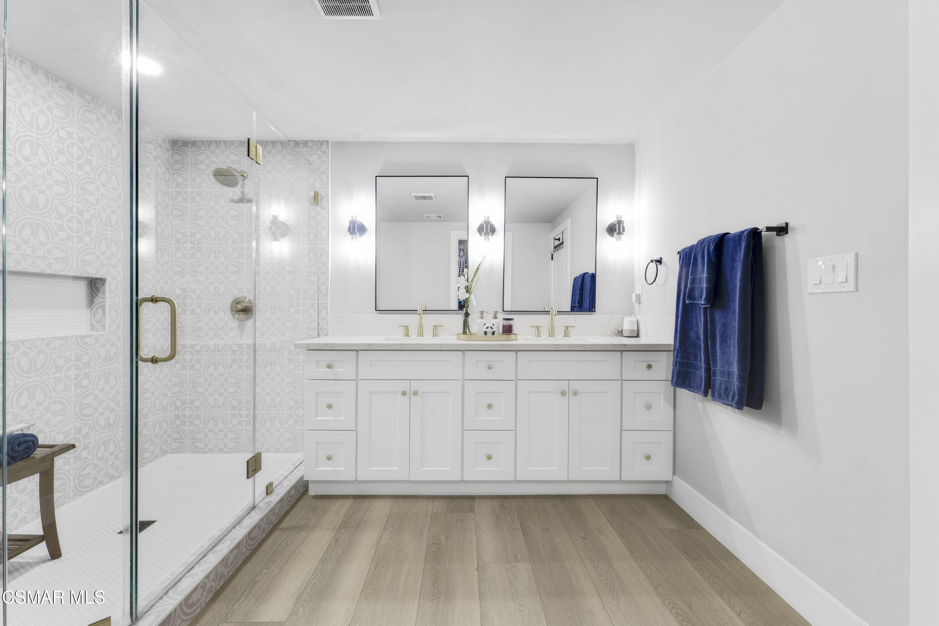 19120 Salt Lake Place Porter Ranch, CA 91326 - Photo 27 of 47 a bathroom with a tub sink and mirror