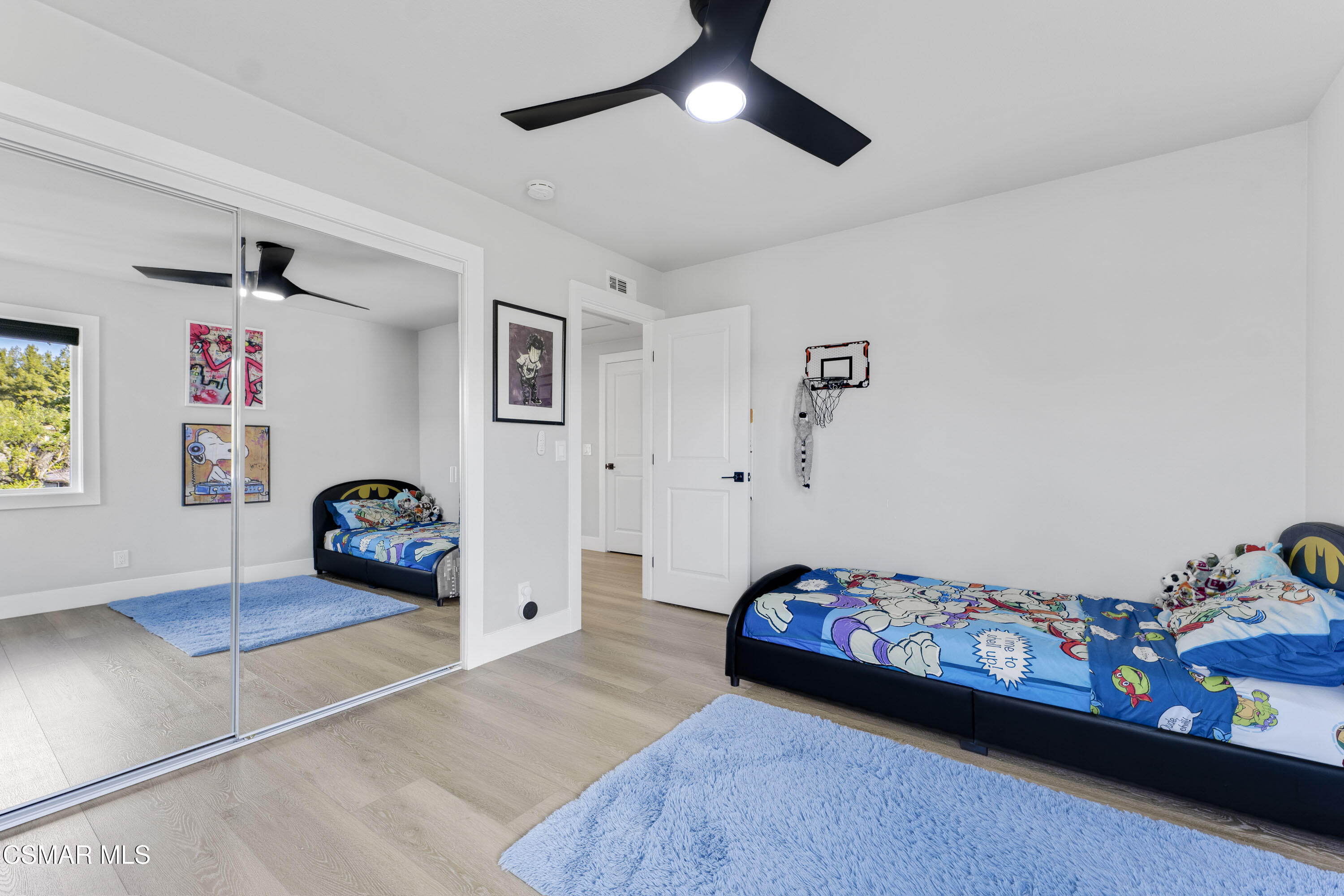 19120 Salt Lake Place Porter Ranch, CA 91326 - Photo 32 of 47 a bedroom with furniture and a wooden floor