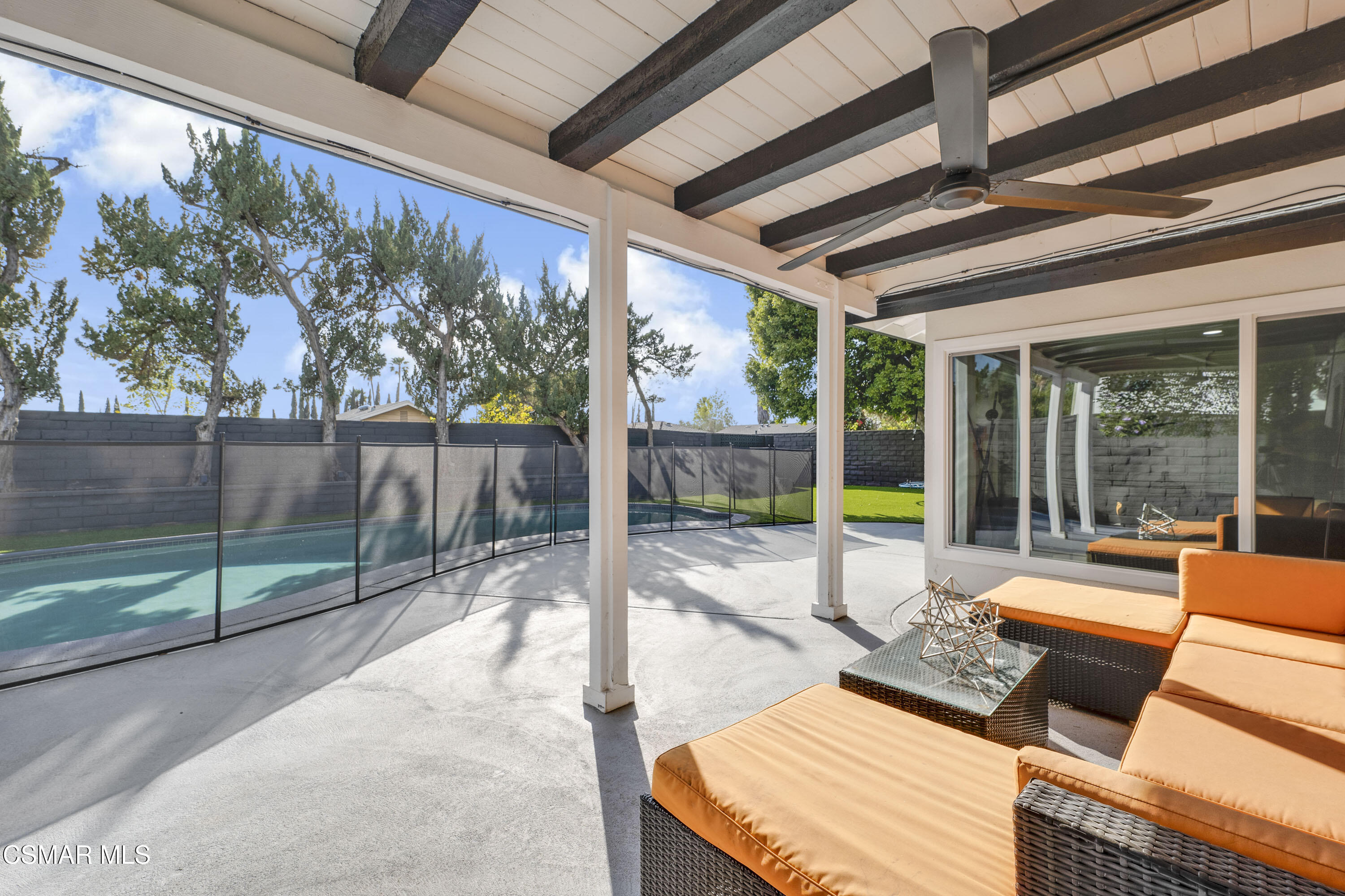 19120 Salt Lake Place Porter Ranch, CA 91326 - Photo 40 of 47 a view of a patio with table and chairs potted plants with wooden floor and fence