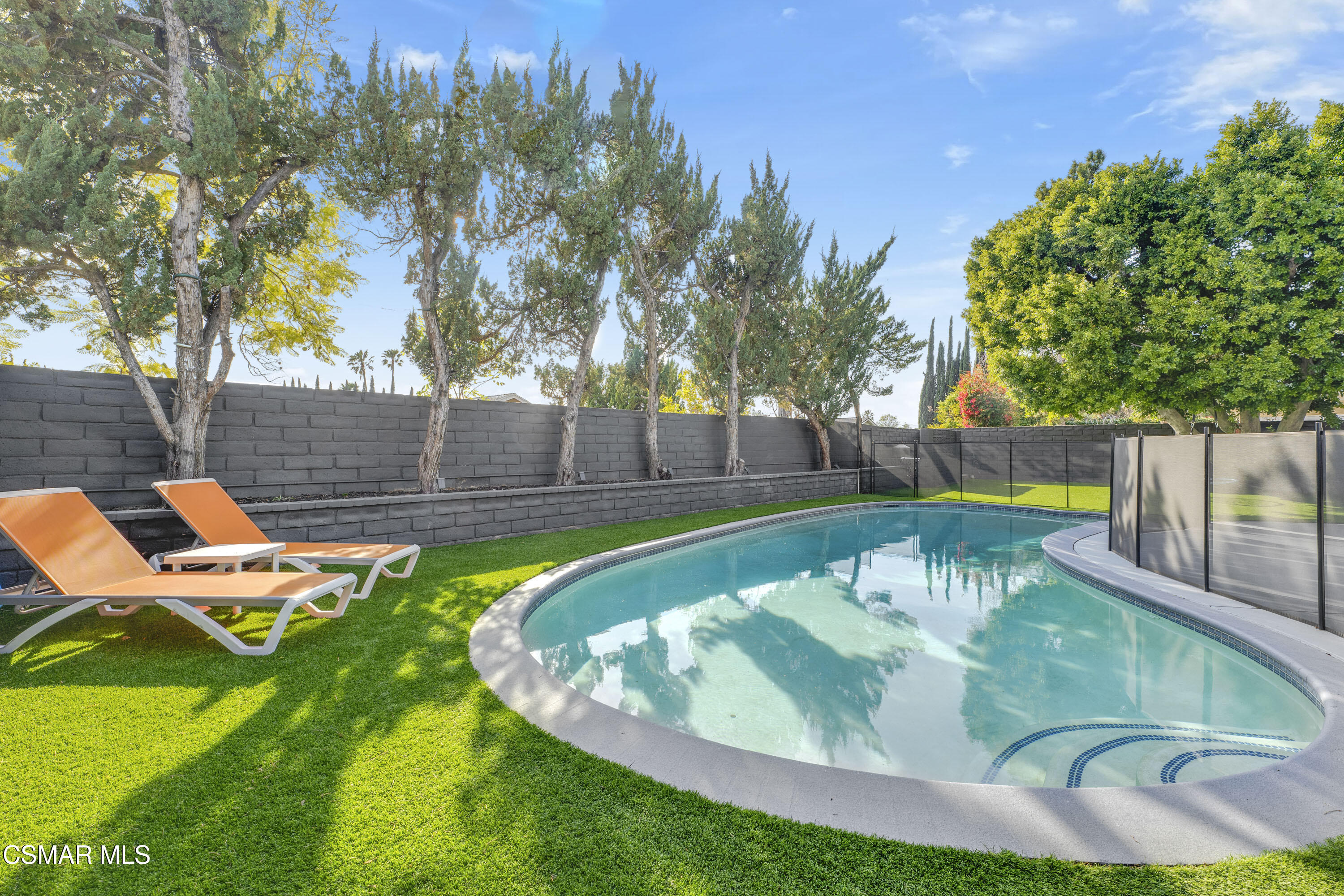 19120 Salt Lake Place Porter Ranch, CA 91326 - Photo 42 of 47 a view of a swimming pool with a patio