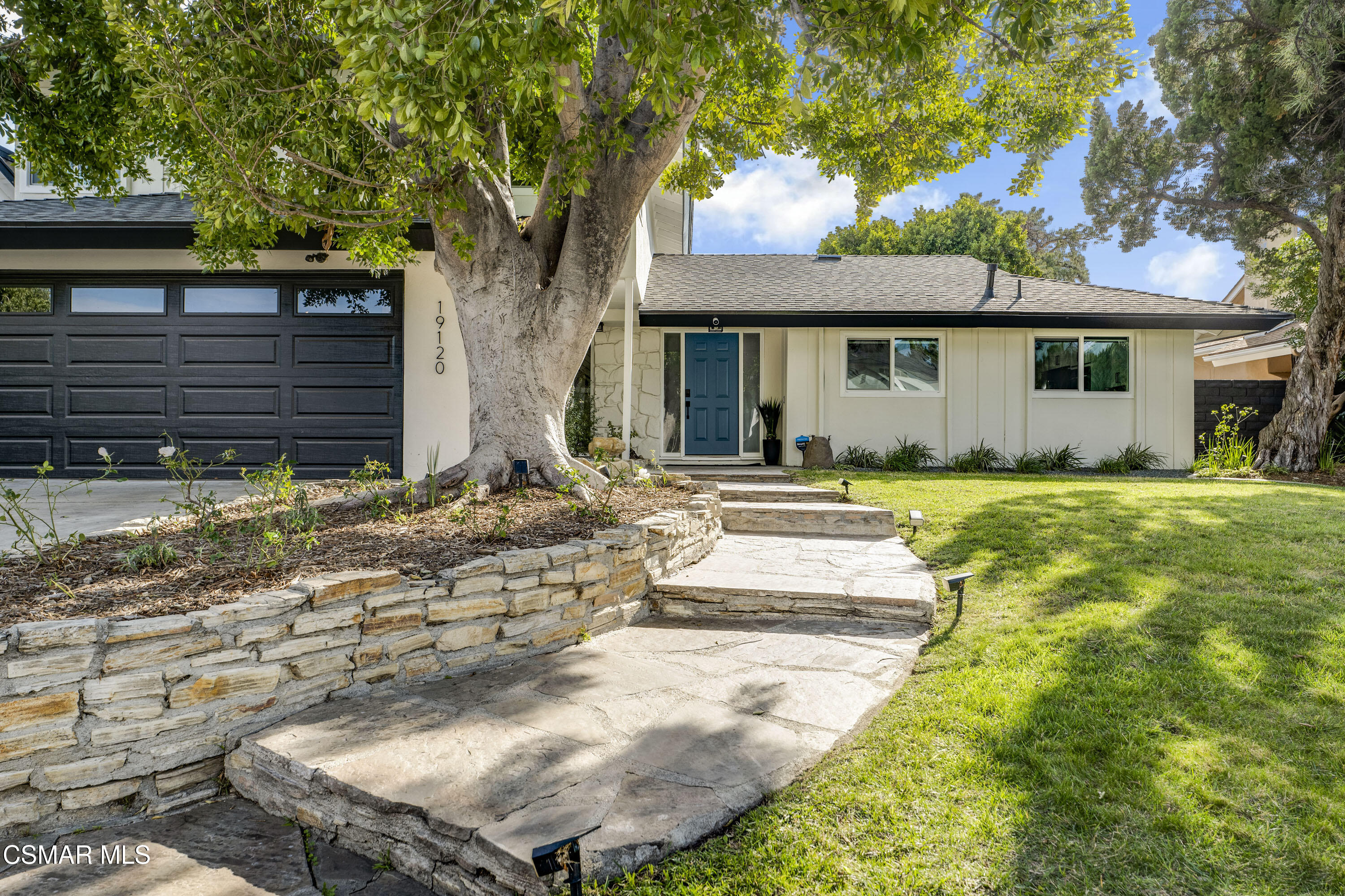 19120 Salt Lake Place Porter Ranch, CA 91326 - Photo 46 of 47 a view of a house with backyard and sitting area