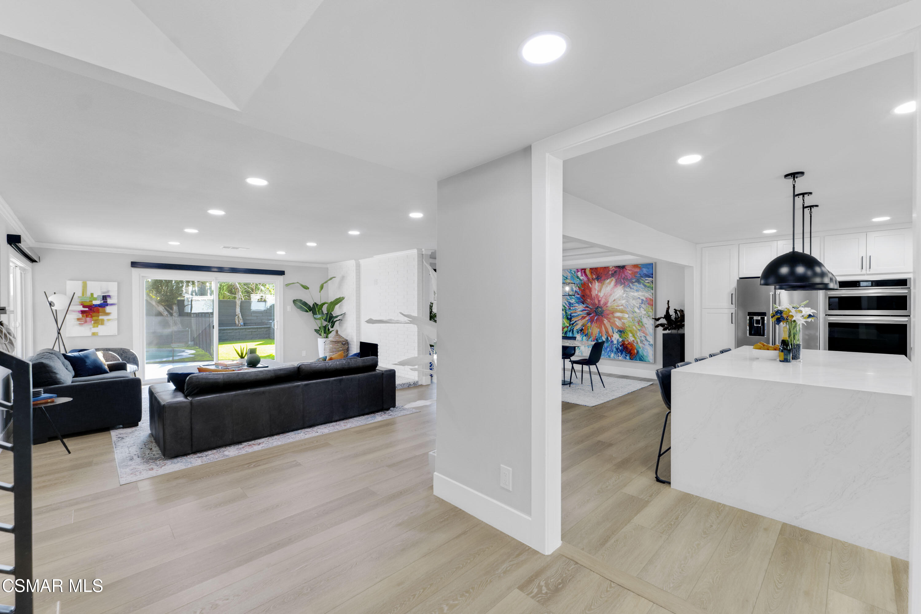 19120 Salt Lake Place Porter Ranch, CA 91326 - Photo 5 of 47 a living room with furniture and a flat screen tv