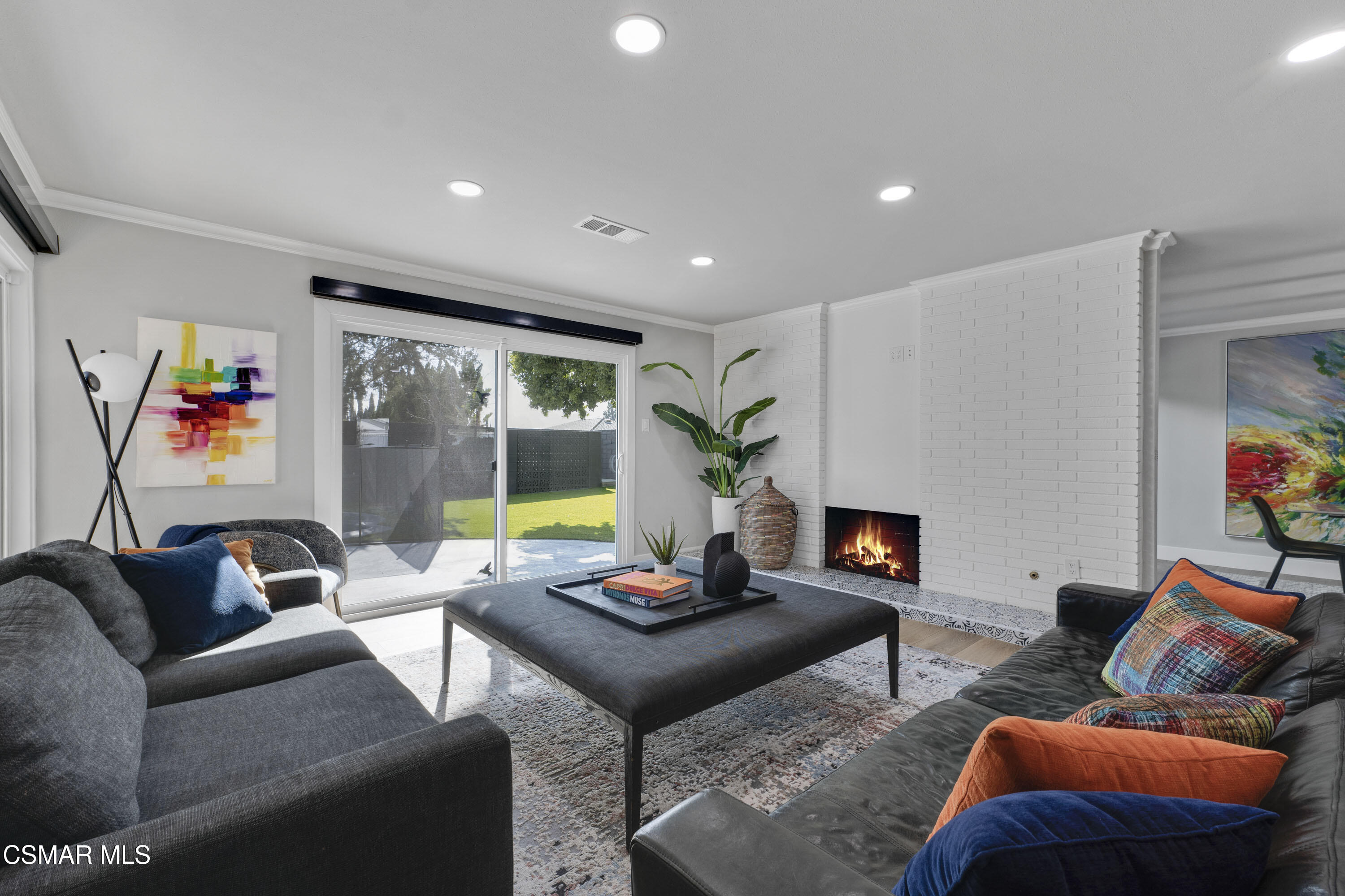 19120 Salt Lake Place Porter Ranch, CA 91326 - Photo 7 of 47 a living room with furniture and a flat screen tv