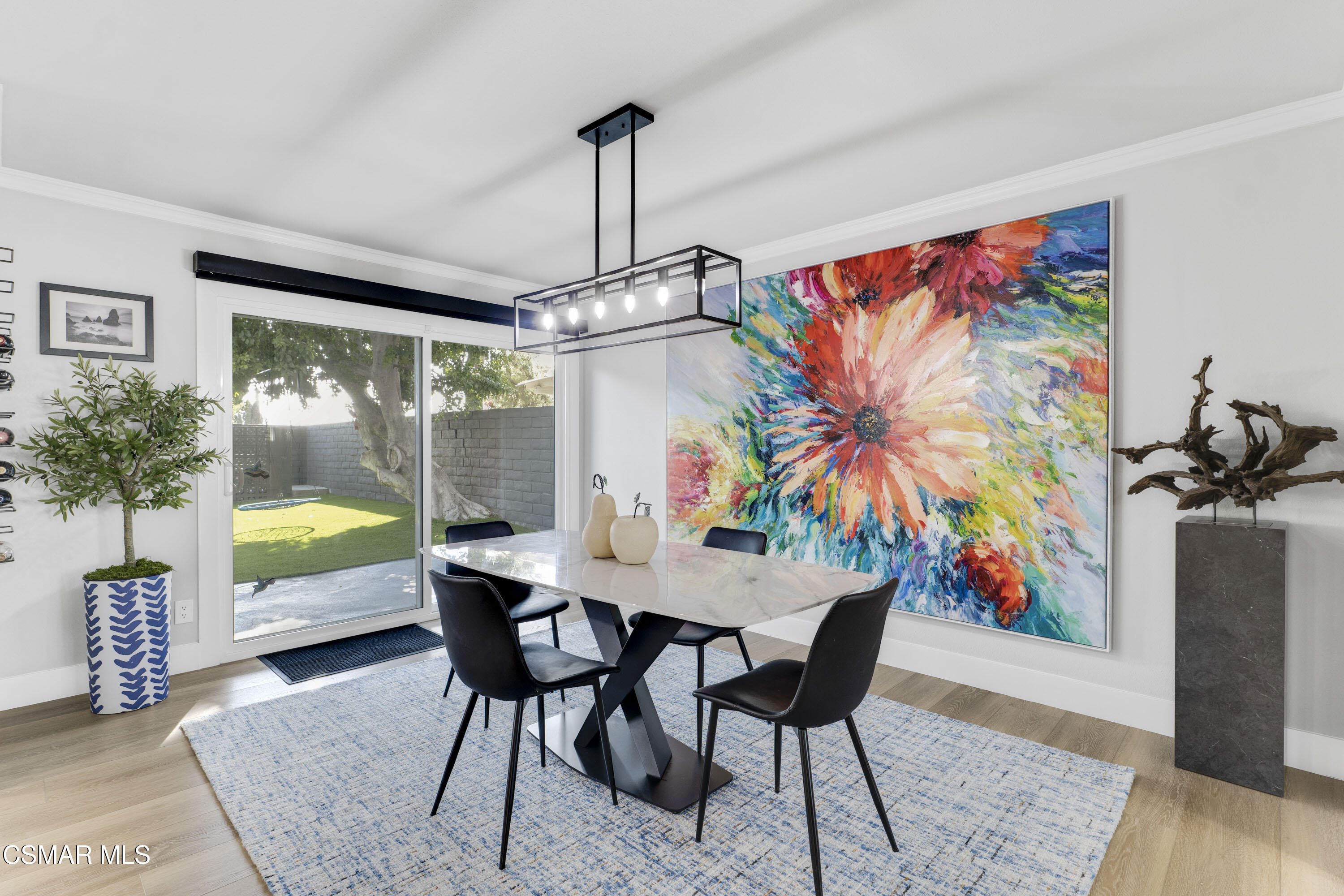 19120 Salt Lake Place Porter Ranch, CA 91326 - Photo 9 of 47 a dining room with furniture garden view and a potted plant