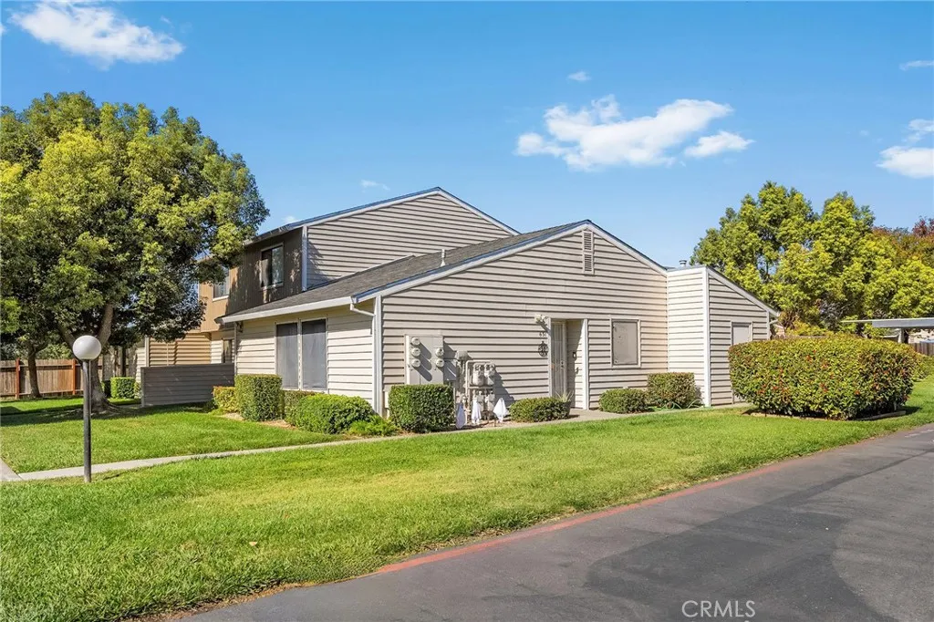631 North Street, Unit 631 Corning, CA 96021 - Photo 1 of 39 a view of a house with a yard and plants