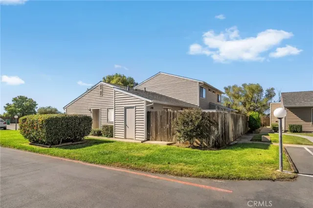 a view of street with parked cars