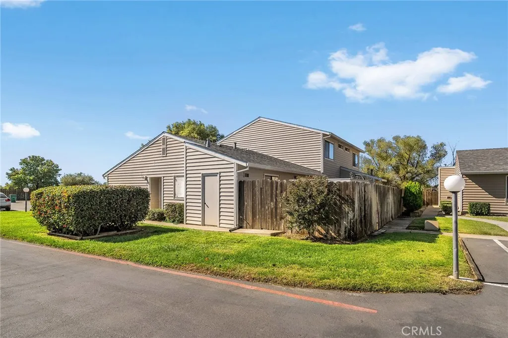 631 North Street, Unit 631 Corning, CA 96021 - Photo 26 of 39 a view of a house with a yard and large tree