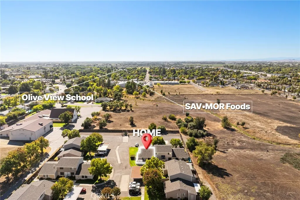 631 North Street, Unit 631 Corning, CA 96021 - Photo 30 of 39 an aerial view of a city with lots of residential buildings