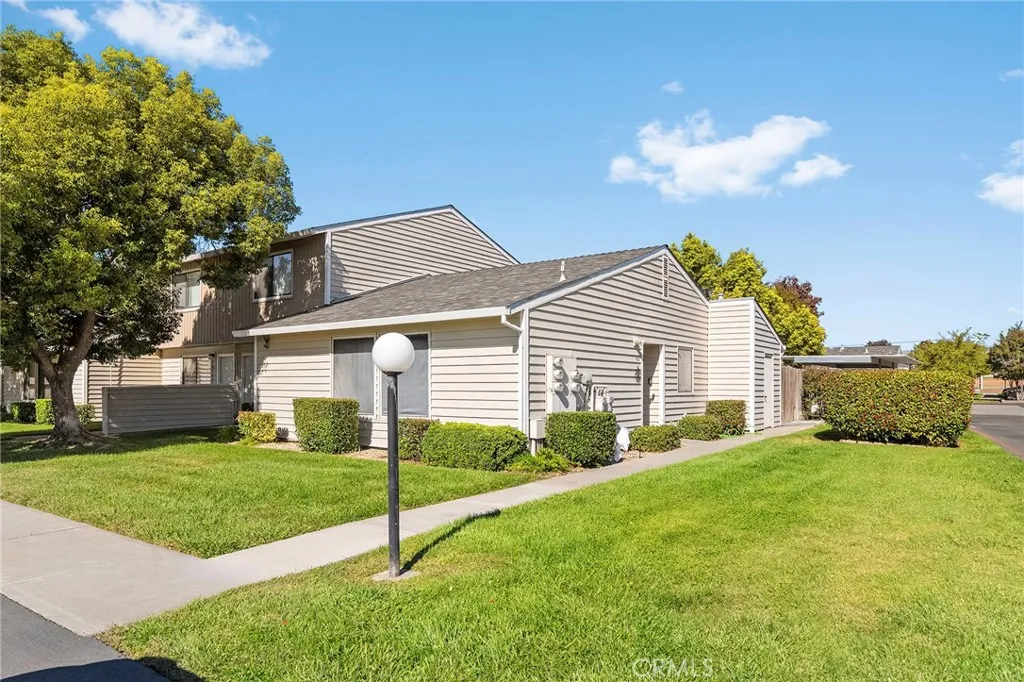 631 North Street, Unit 631 Corning, CA 96021 - Photo 35 of 39 a view of a house with a yard and pathway