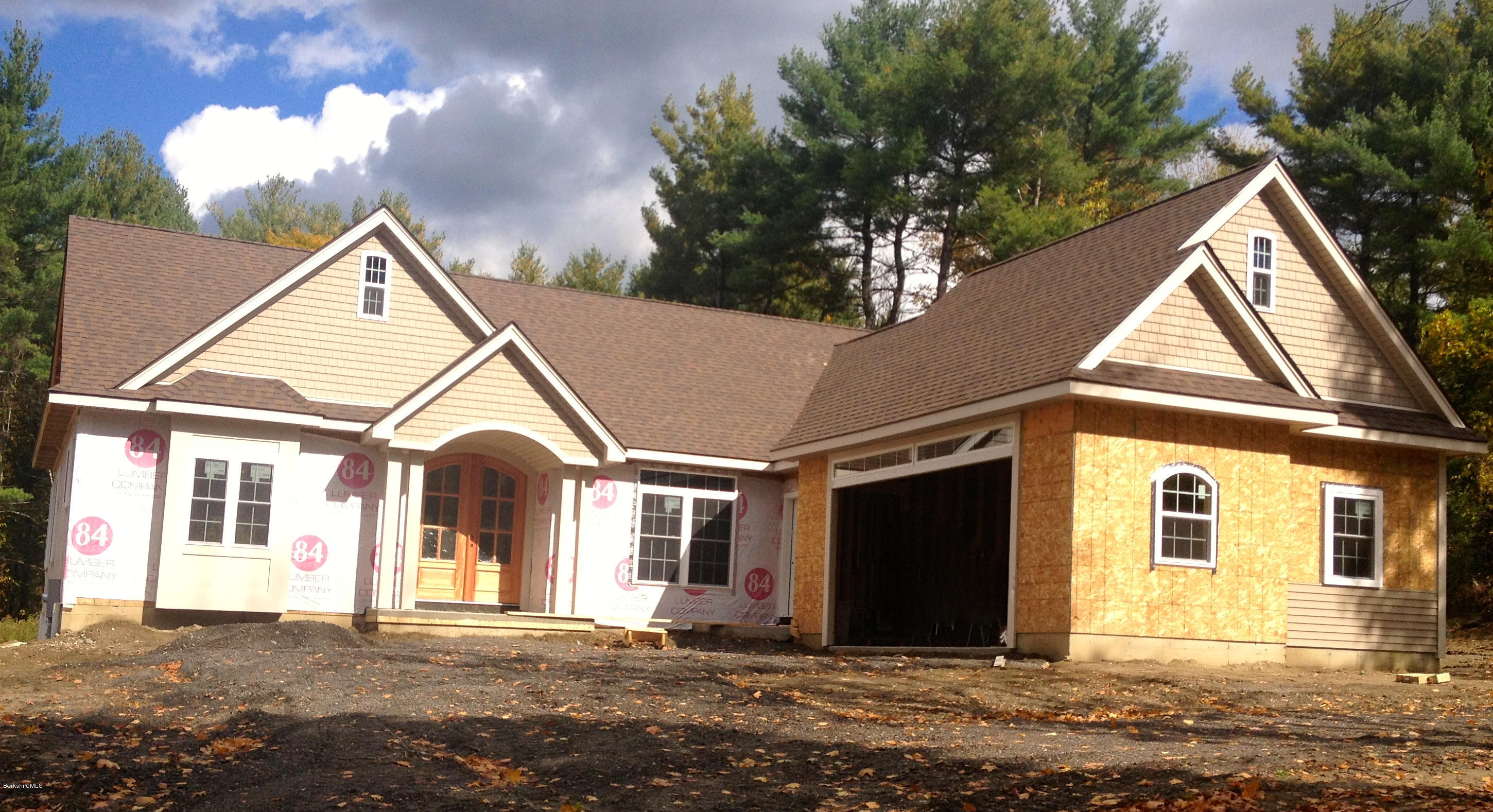 600 Devon Road Lee, MA 01238 - Photo 1 of 15 a view of a house with a yard