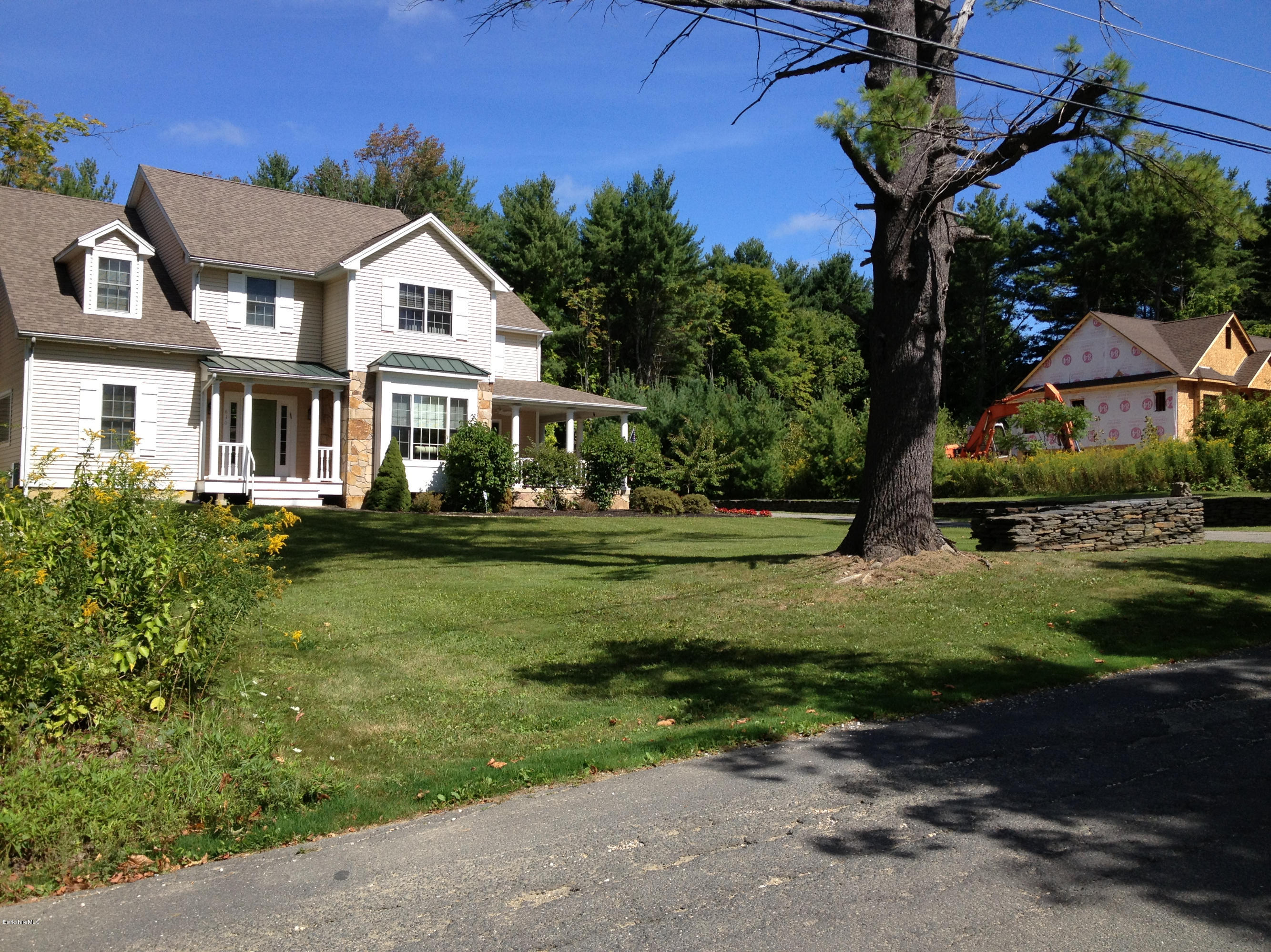 600 Devon Road Lee, MA 01238 - Photo 8 of 15 a front view of a house with a garden