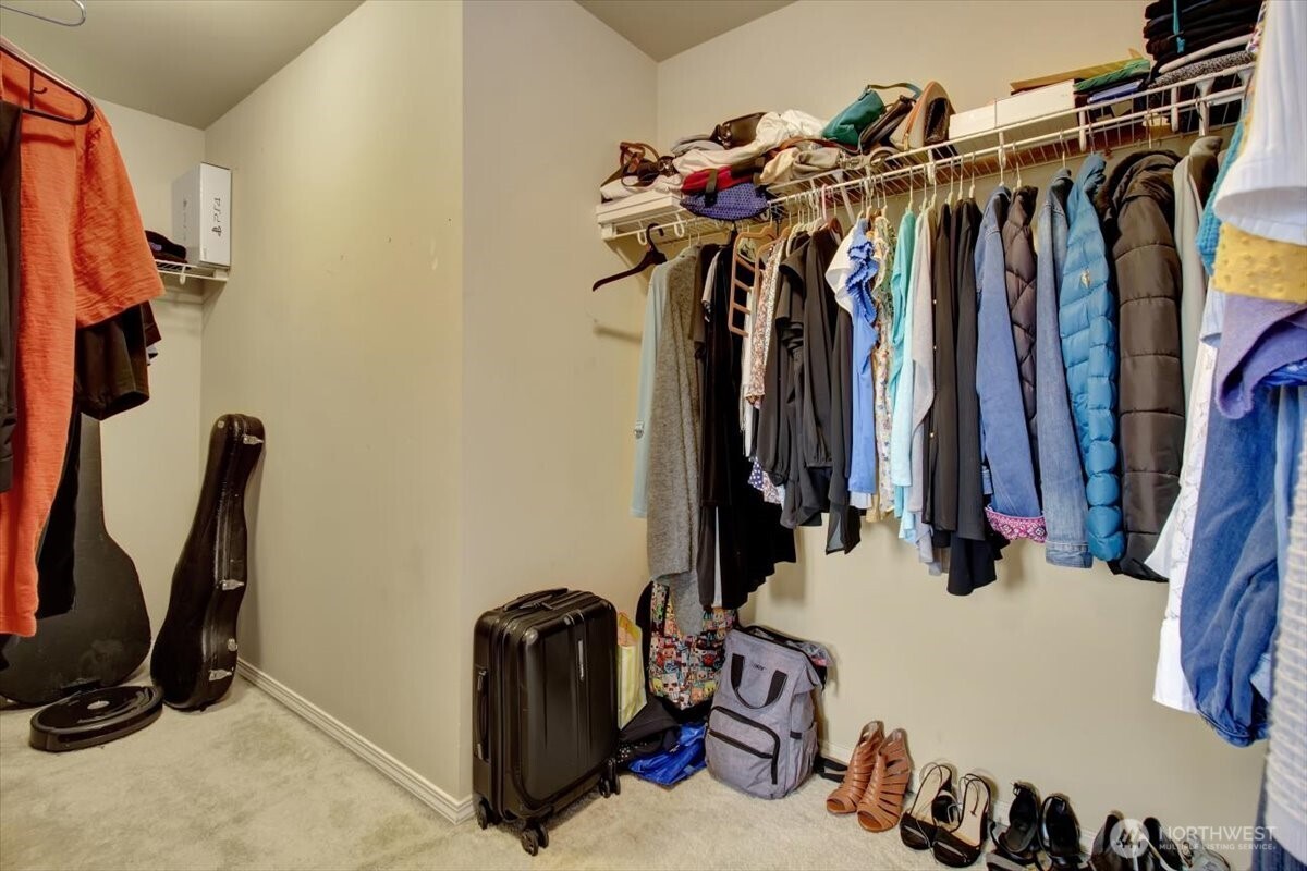 5488 Buckhorn Way Mount Vernon, WA 98273 - Photo 28 of 40 a view of walk in closet with clothes