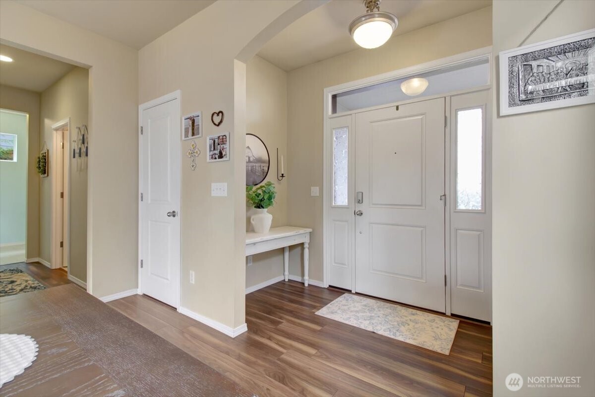 5488 Buckhorn Way Mount Vernon, WA 98273 - Photo 4 of 40 a view of empty room with wooden floor and fan