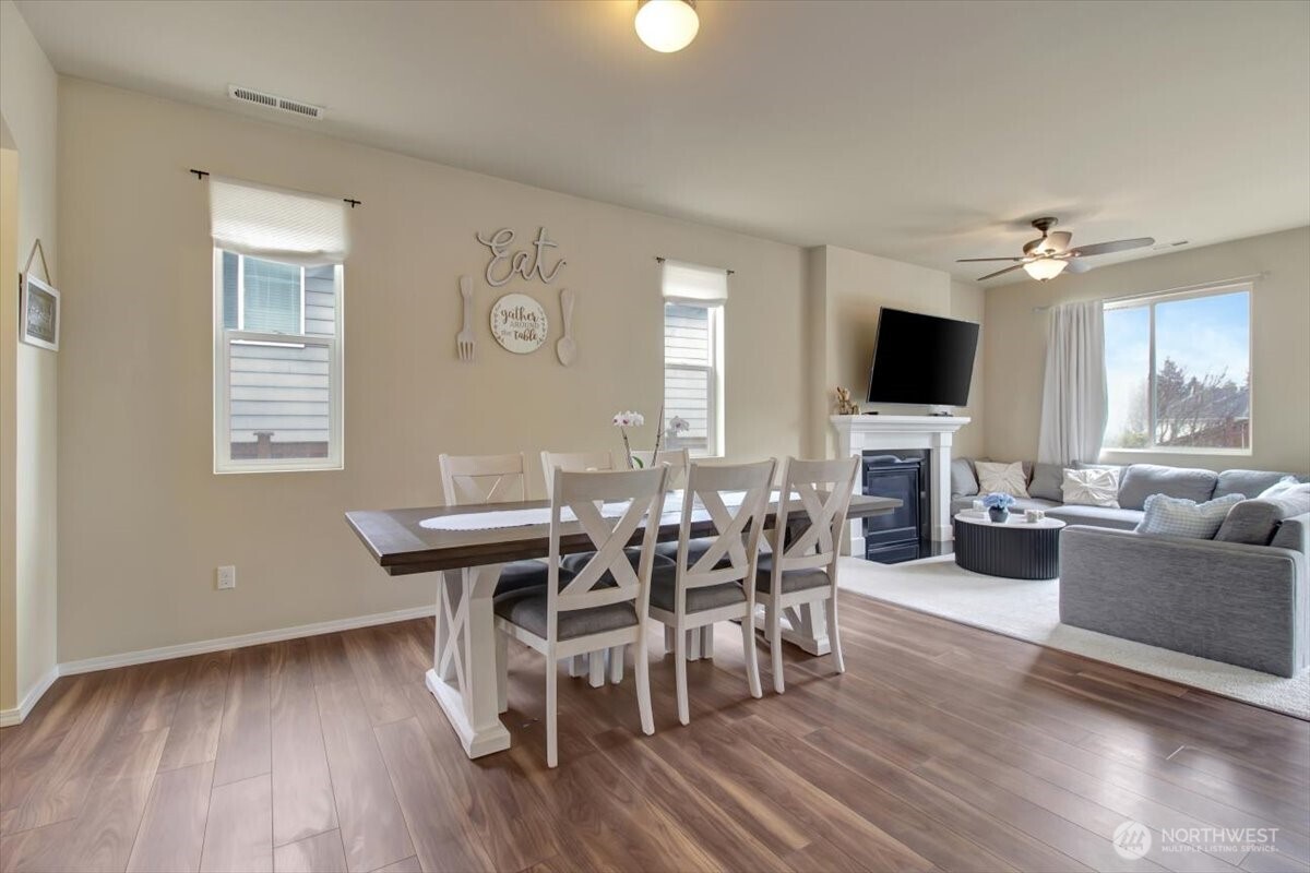 5488 Buckhorn Way Mount Vernon, WA 98273 - Photo 5 of 40 a view of a dining room with furniture window and wooden floor