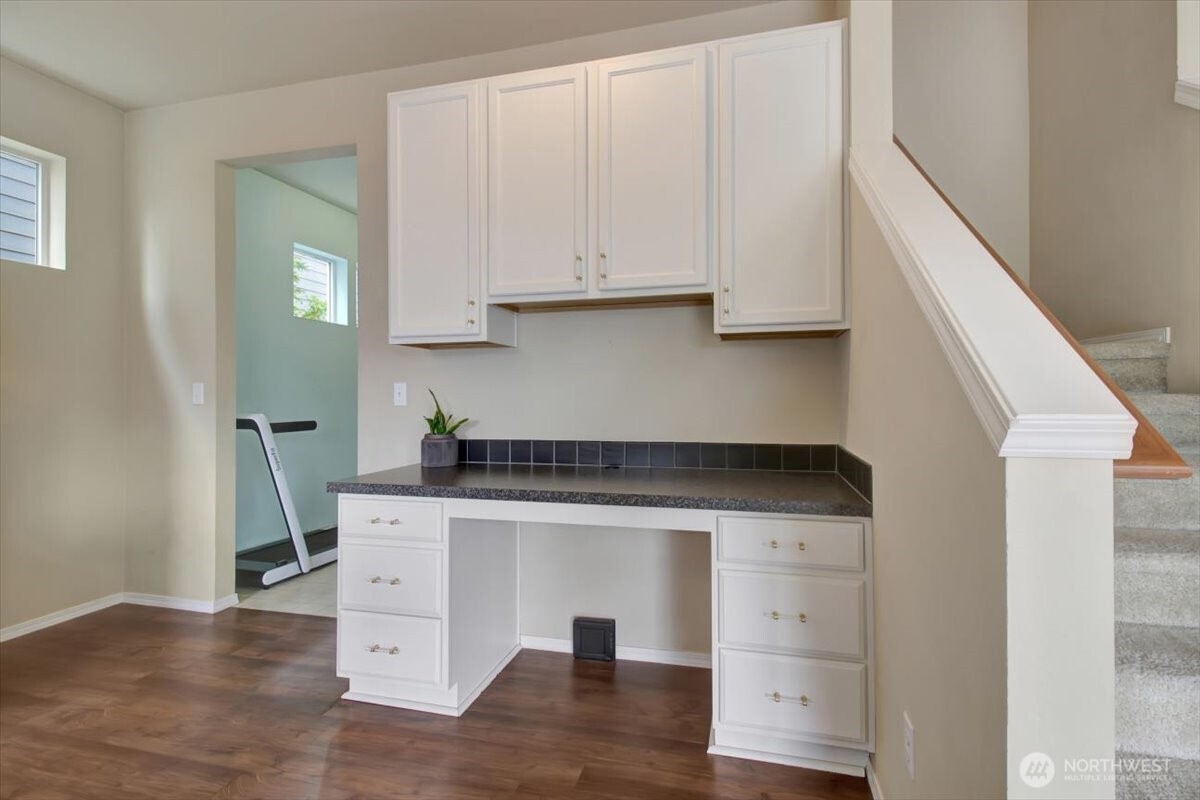 5488 Buckhorn Way Mount Vernon, WA 98273 - Photo 10 of 40 a kitchen with cabinets appliances and a wooden floor
