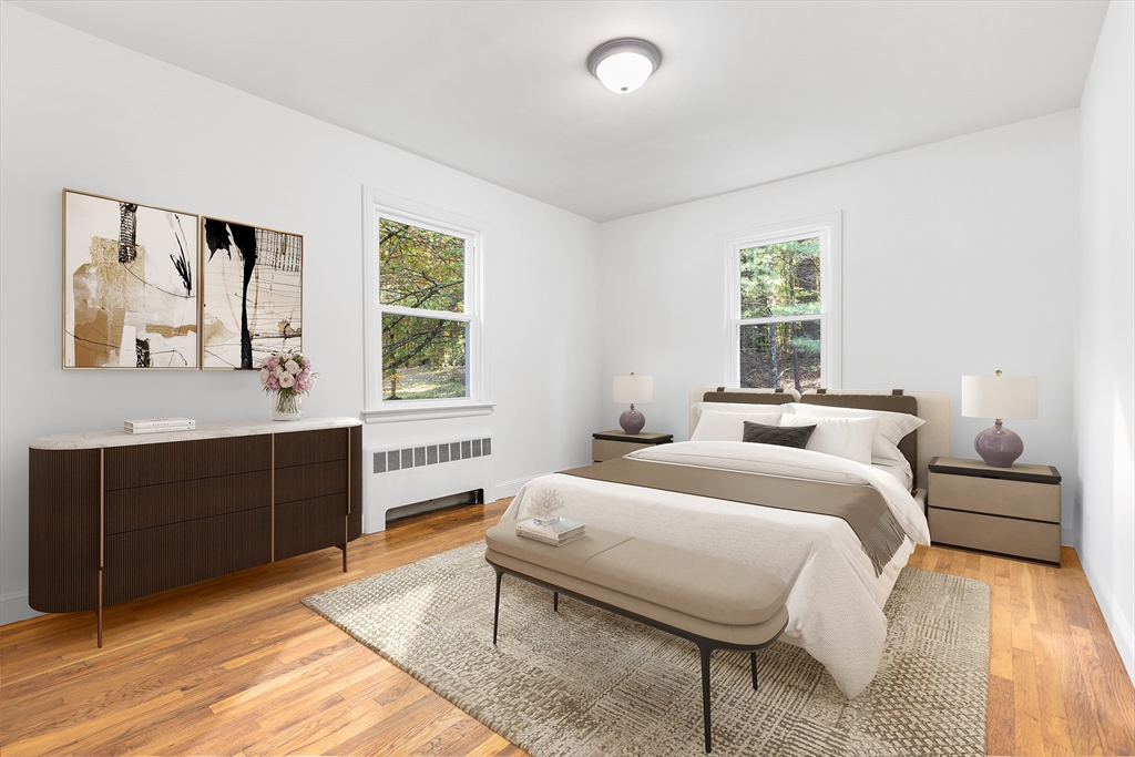 222 Forge Village Road Groton, MA 01450 - Photo 9 of 12 a bedroom with a bed and a dresser